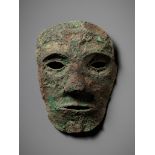 A BRONZE DEATH MASK, DONG SON CULTURE