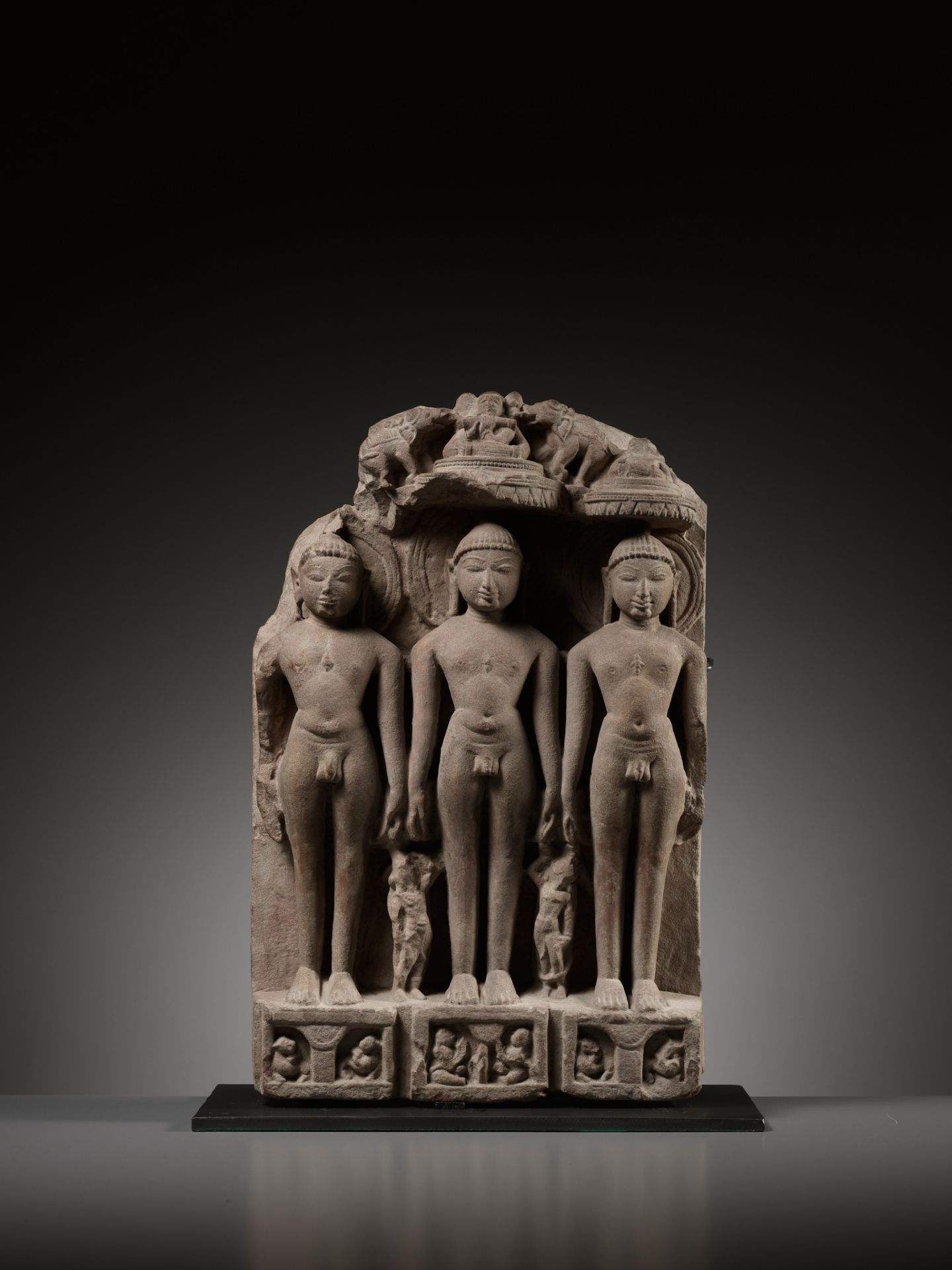 A JAIN SANDSTONE STELE OF THREE JINAS, WESTERN INDIA, RAJASTHAN OR GUJARAT, 10TH-12TH CENTURY - Image 7 of 14