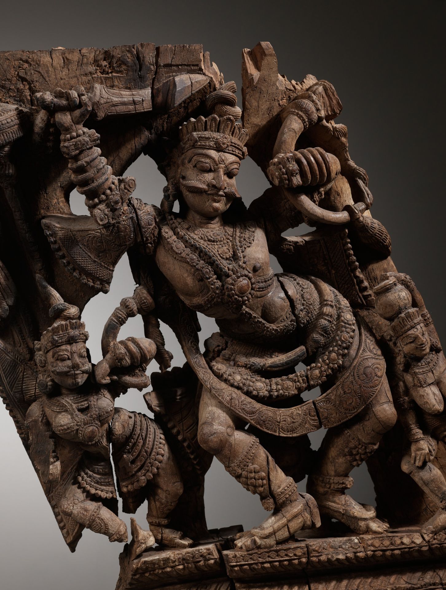 A WOOD RELIEF OF A DANCING DEITY, KERALA, SOUTH INDIA, 18TH TO EARLY 19TH CENTURY