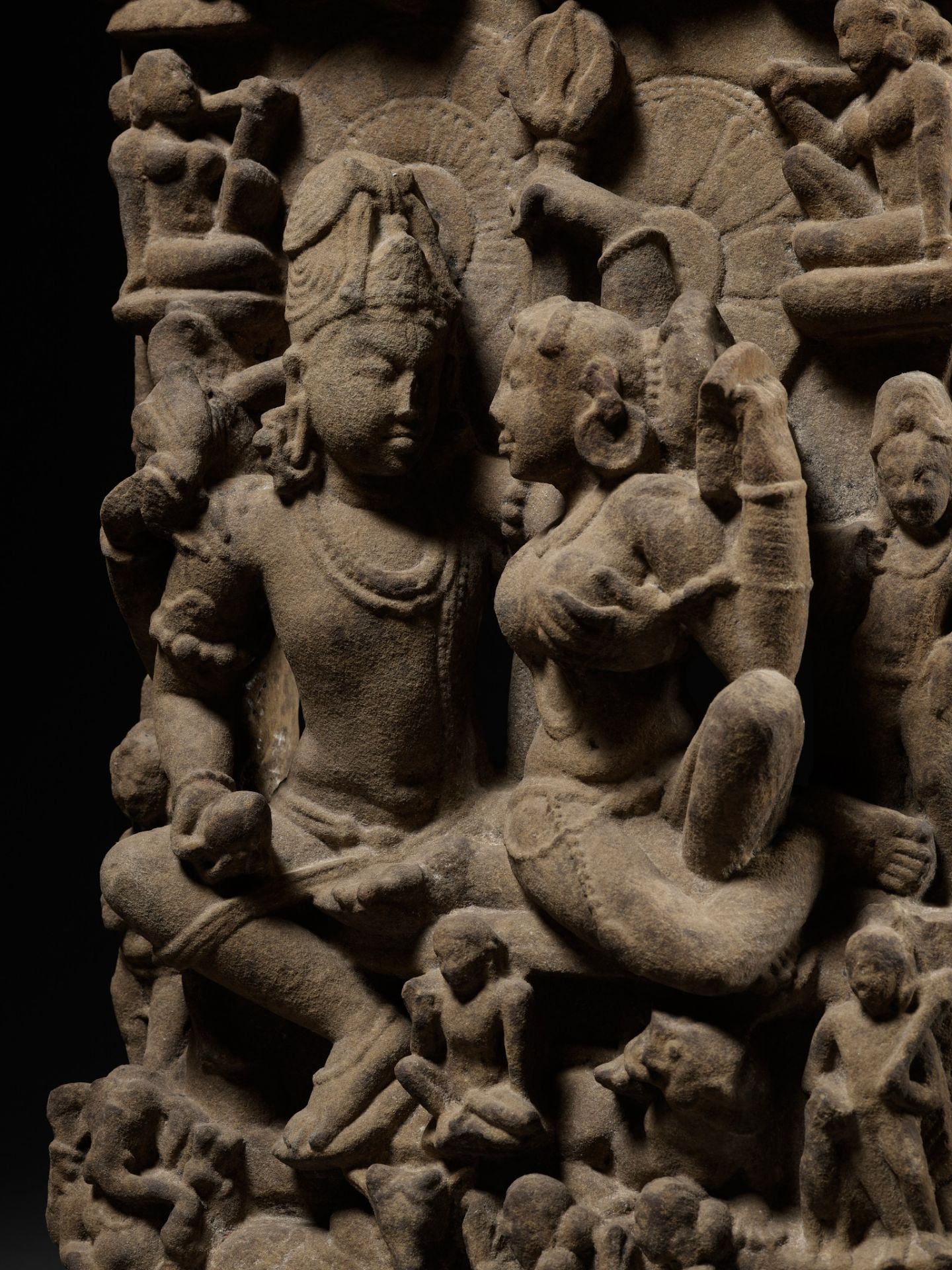 A SANDSTONE STELE OF UMA MAHESHVARA, CENTRAL INDIA, 11TH-12TH CENTURY