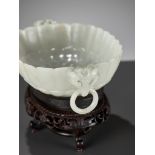 A MUGHAL-STYLE WHITE JADE 'CHRYSANTHEMUM' MARRIAGE BOWL, 18TH CENTURY