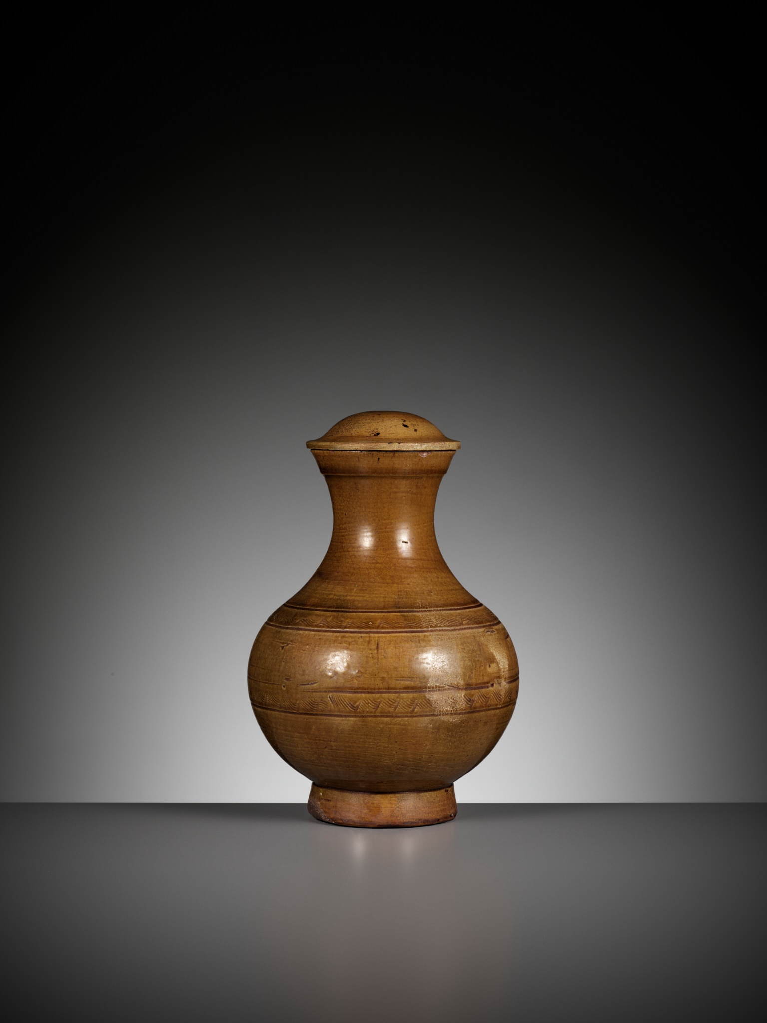 AN AMBER-GLAZED POTTERY VASE AND COVER, HU, HAN DYNASTY - Image 7 of 12