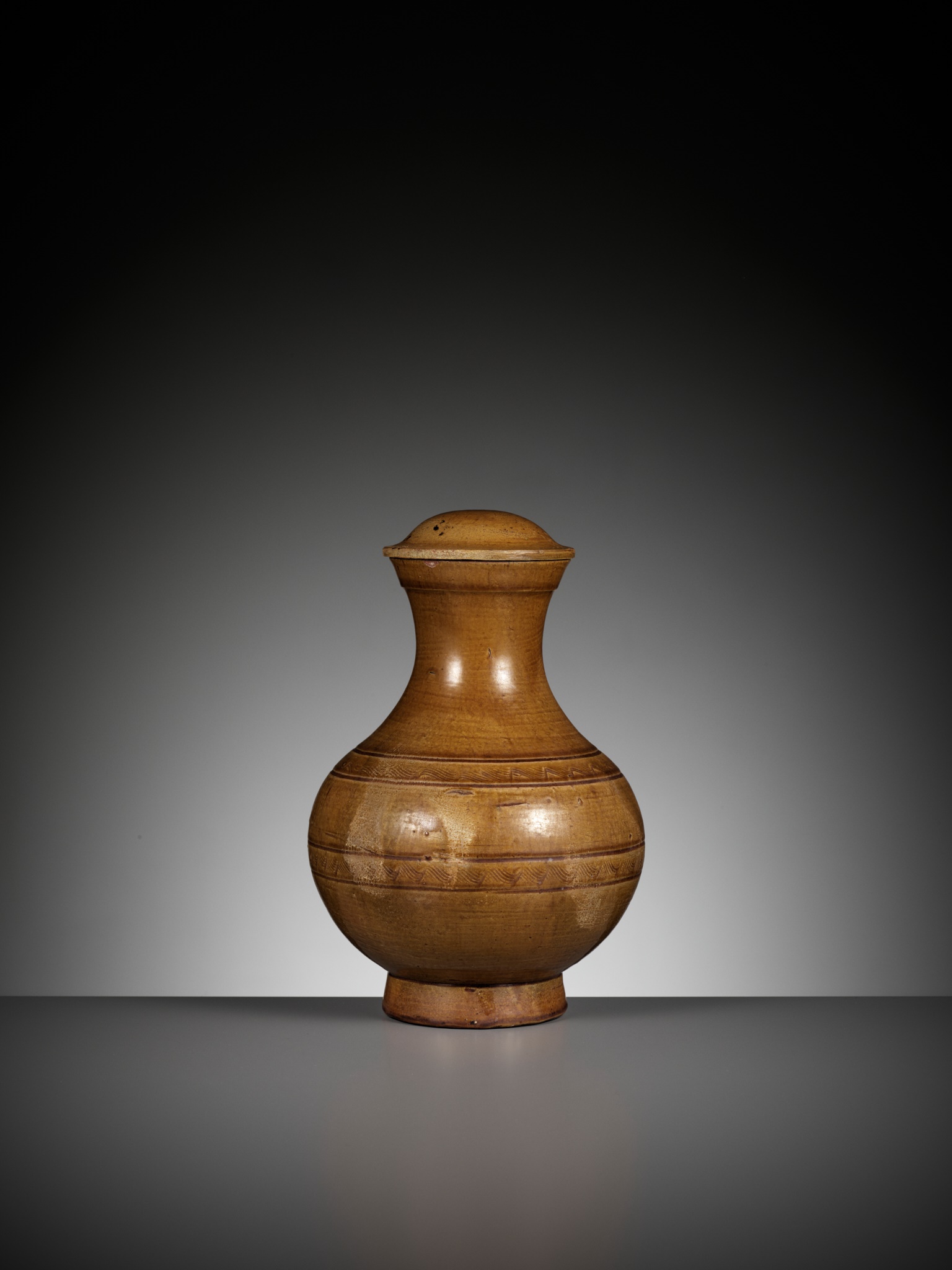 AN AMBER-GLAZED POTTERY VASE AND COVER, HU, HAN DYNASTY - Image 9 of 12