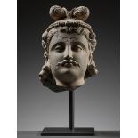 AN IMPORTANT SCHIST HEAD OF MAITREYA, ANCIENT REGION OF GANDHARA, 2ND-3RD CENTURY