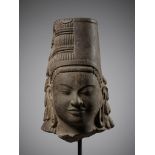 A RARE SANDSTONE HEAD OF HARIHARA, PRE-ANGKOR PERIOD