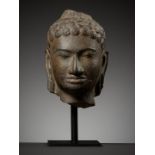 A SANDSTONE HEAD OF BUDDHA SHAKYAMUNI, MON-DVARAVATI PERIOD