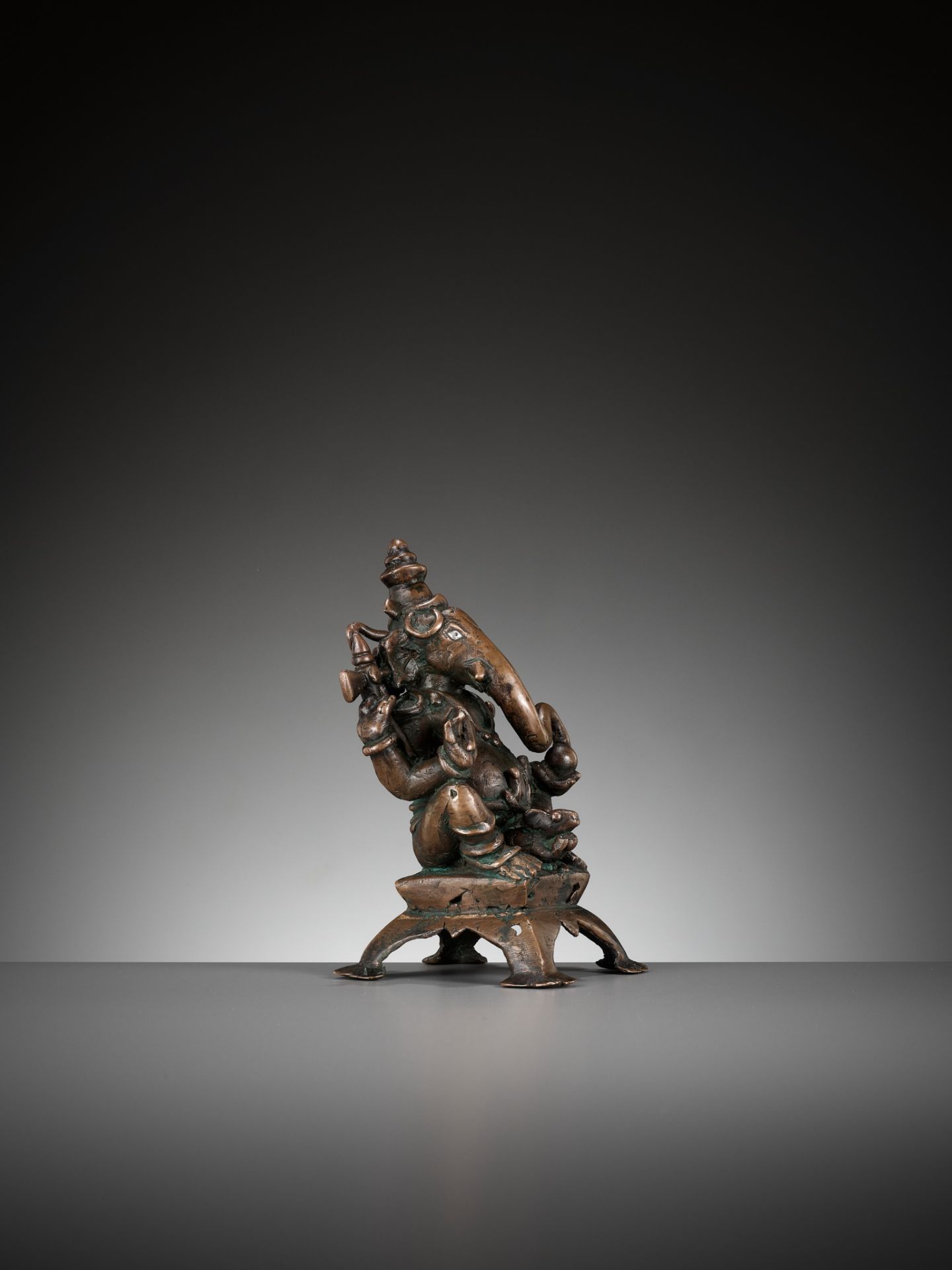A SILVER-INLAID COPPER ALLOY FIGURE OF GANESHA, SOUTH INDIA, C. 1650-1750 - Image 9 of 12