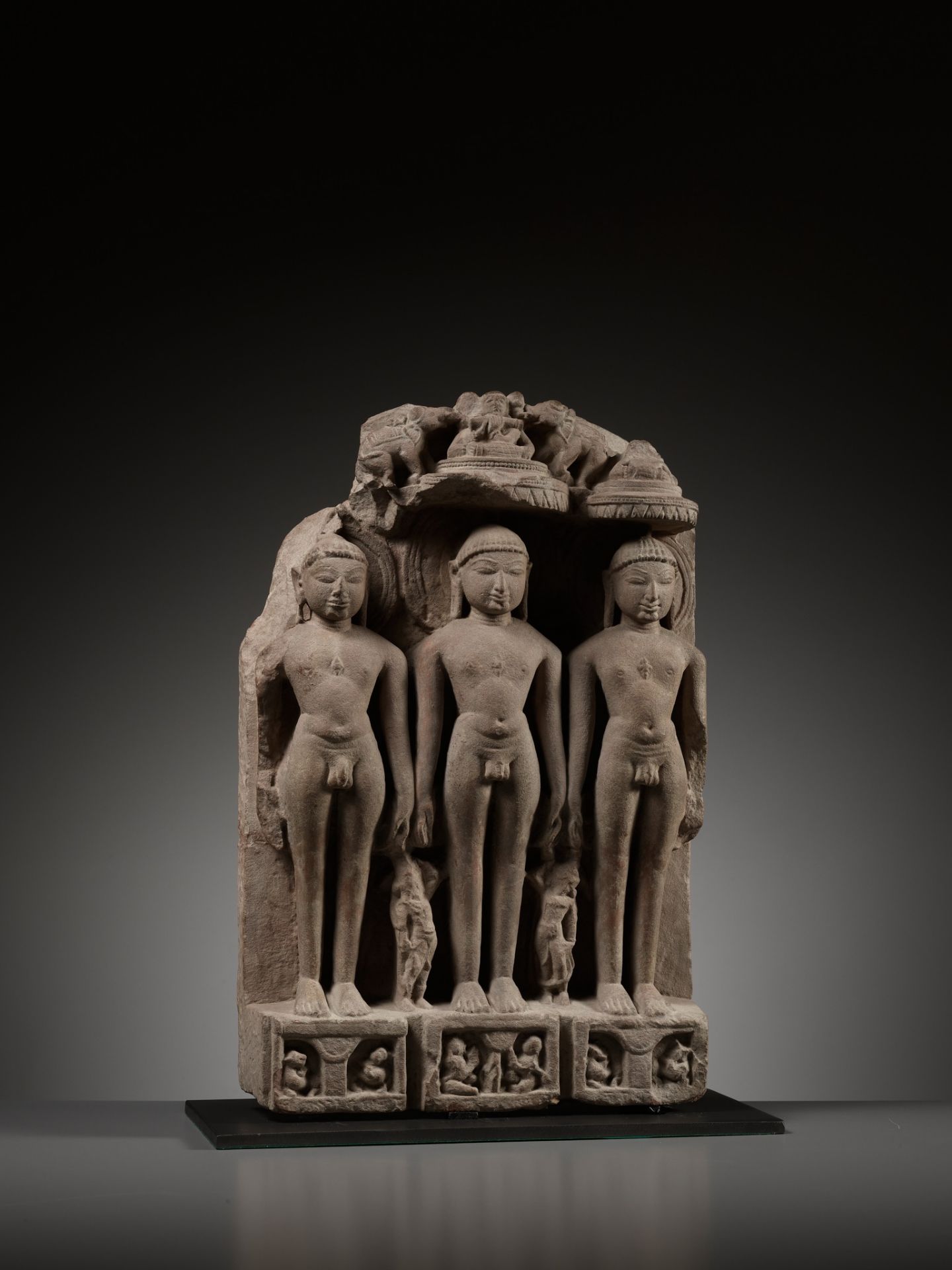 A JAIN SANDSTONE STELE OF THREE JINAS, WESTERN INDIA, RAJASTHAN OR GUJARAT, 10TH-12TH CENTURY - Image 13 of 14