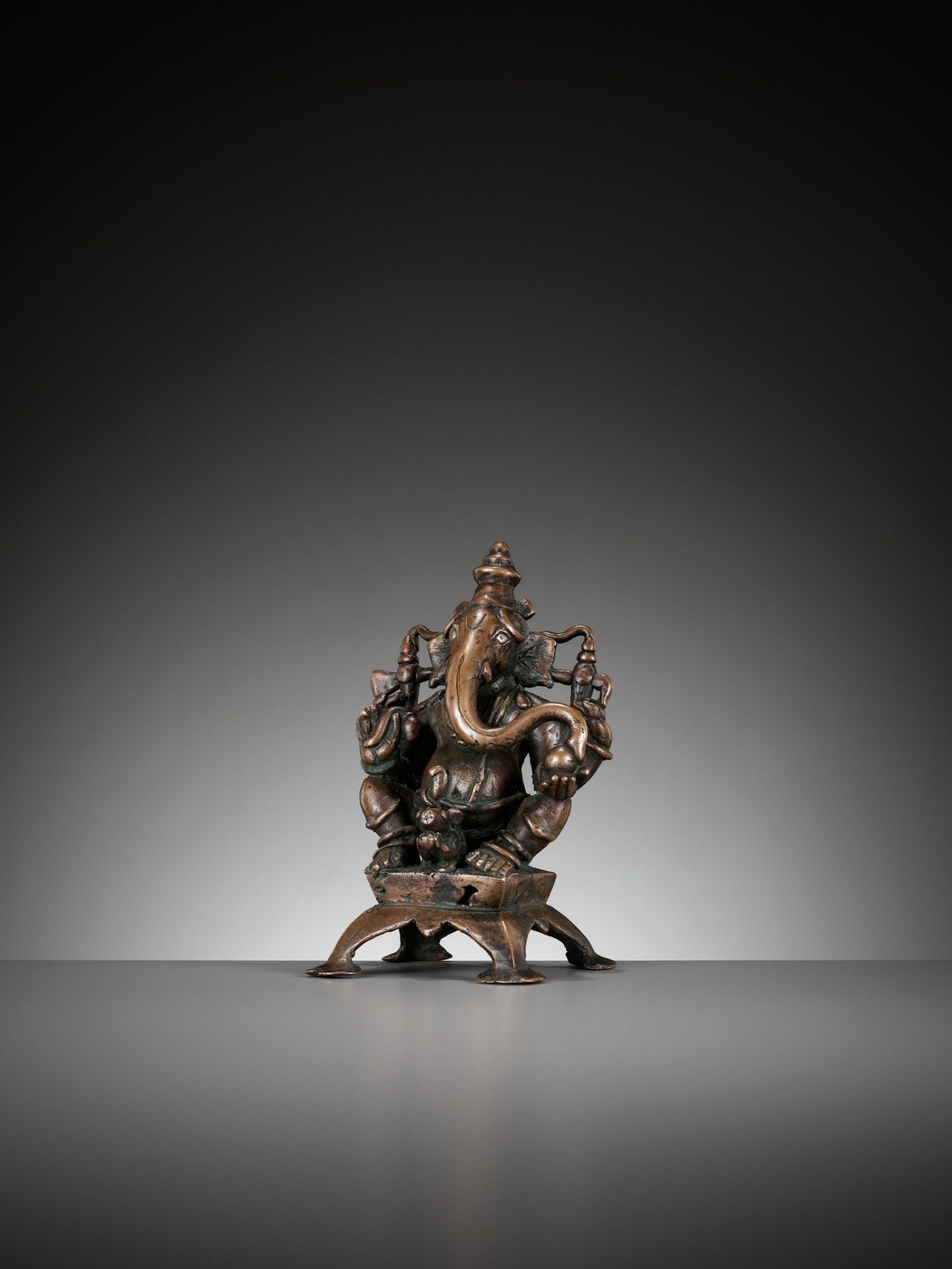 A SILVER-INLAID COPPER ALLOY FIGURE OF GANESHA, SOUTH INDIA, C. 1650-1750 - Image 6 of 12