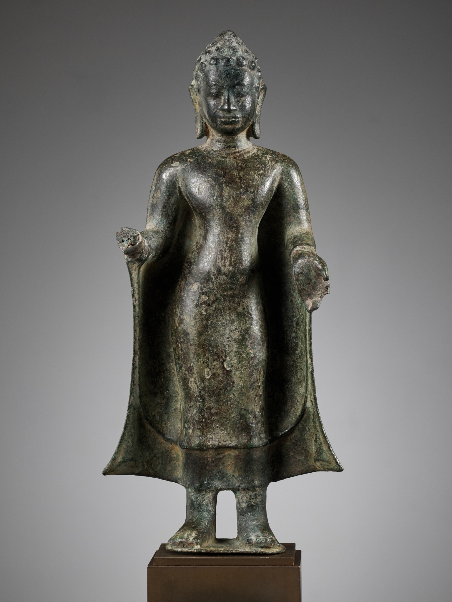 A RARE BRONZE FIGURE OF BUDDHA, MON DVARAVATI PERIOD