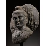 A GRAY SCHIST HEAD OF BUDDHA, KUSHAN PERIOD