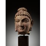 A RED SANDSTONE HEAD OF BUDDHA, MATHURA, KUSHAN PERIOD