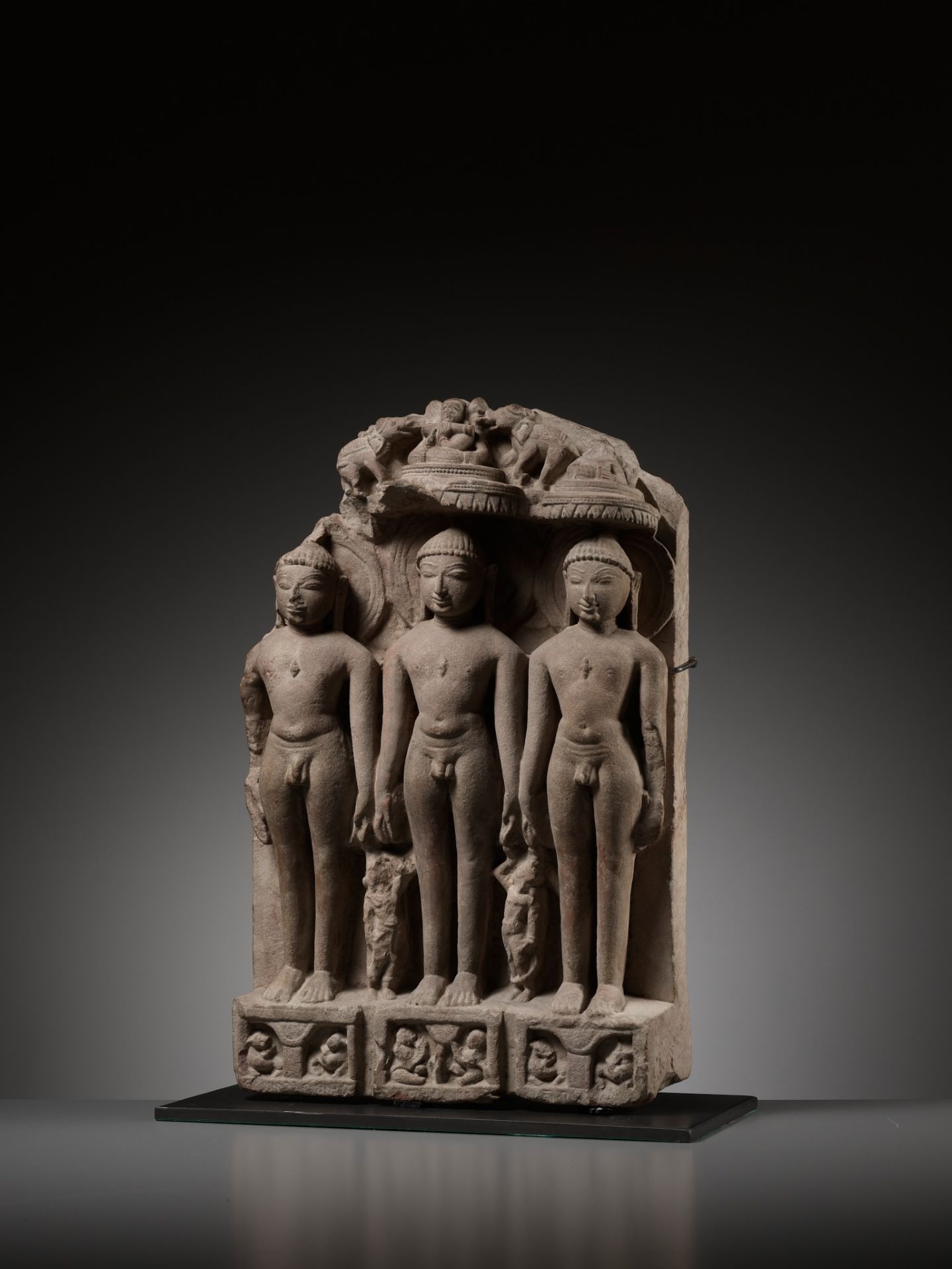 A JAIN SANDSTONE STELE OF THREE JINAS, WESTERN INDIA, RAJASTHAN OR GUJARAT, 10TH-12TH CENTURY - Image 9 of 14