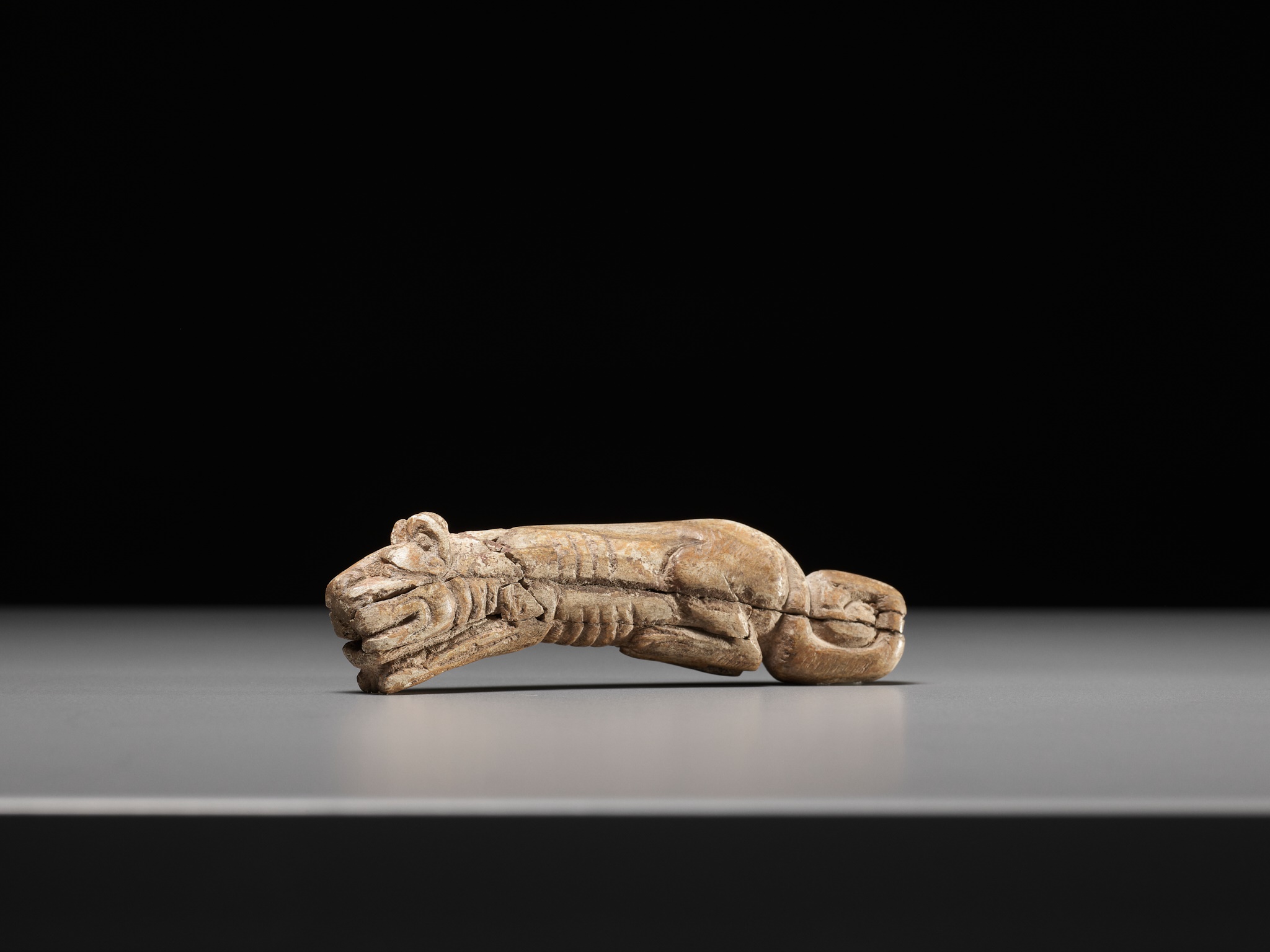 A RARE CARVED BONE FIGURE OF A TIGER, SHANG DYNASTY - Image 14 of 17