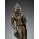 A BRONZE FIGURE OF A STANDING BUDDHA, POST-GUPTA PERIOD, INDIA, C. 7TH CENTURY