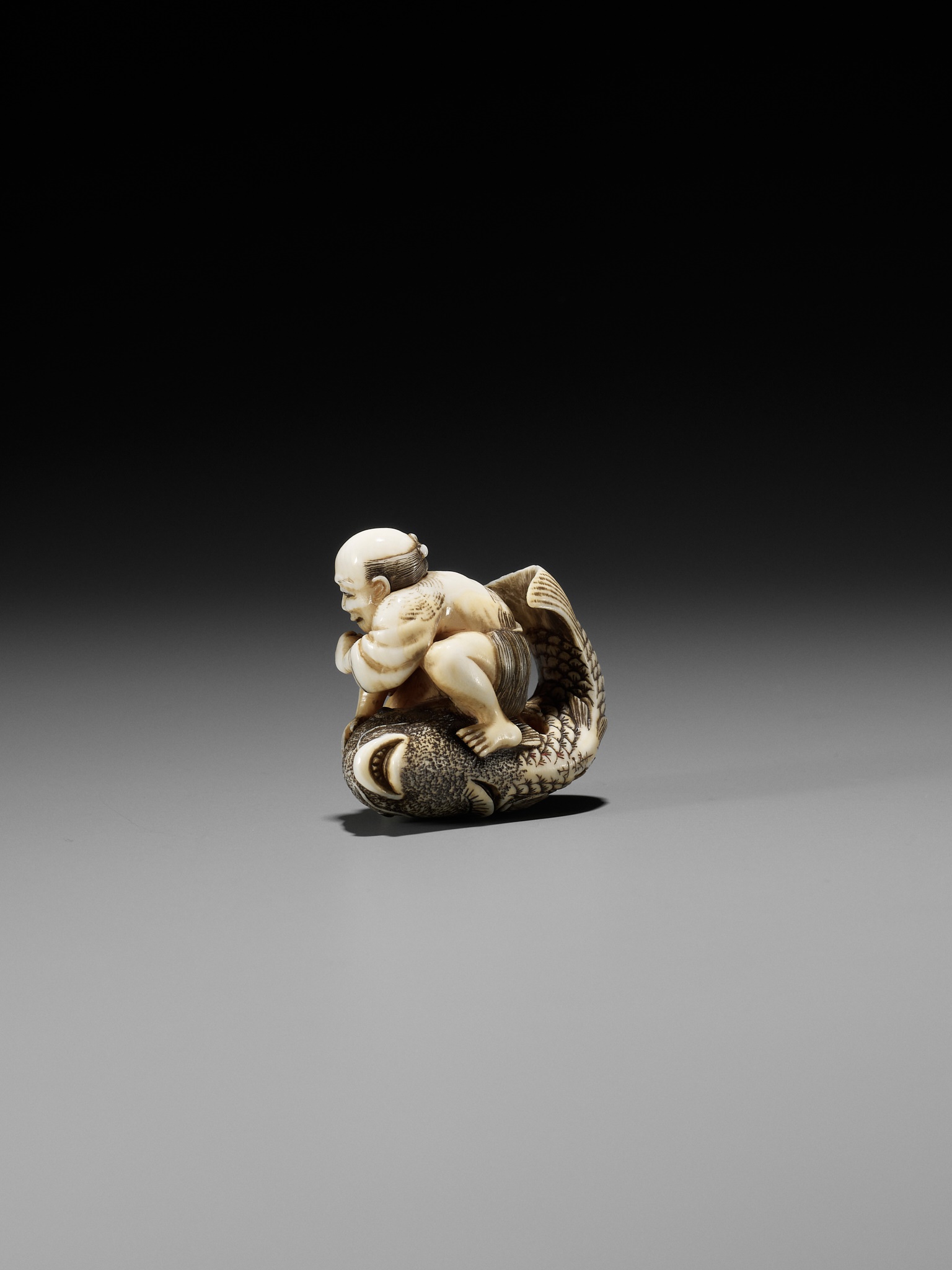 MASAMINE: A FINE OSAKA SCHOOL IVORY NETSUKE OF A FISHERMAN STRUGGLING WITH A HUGE CARP - Image 8 of 14