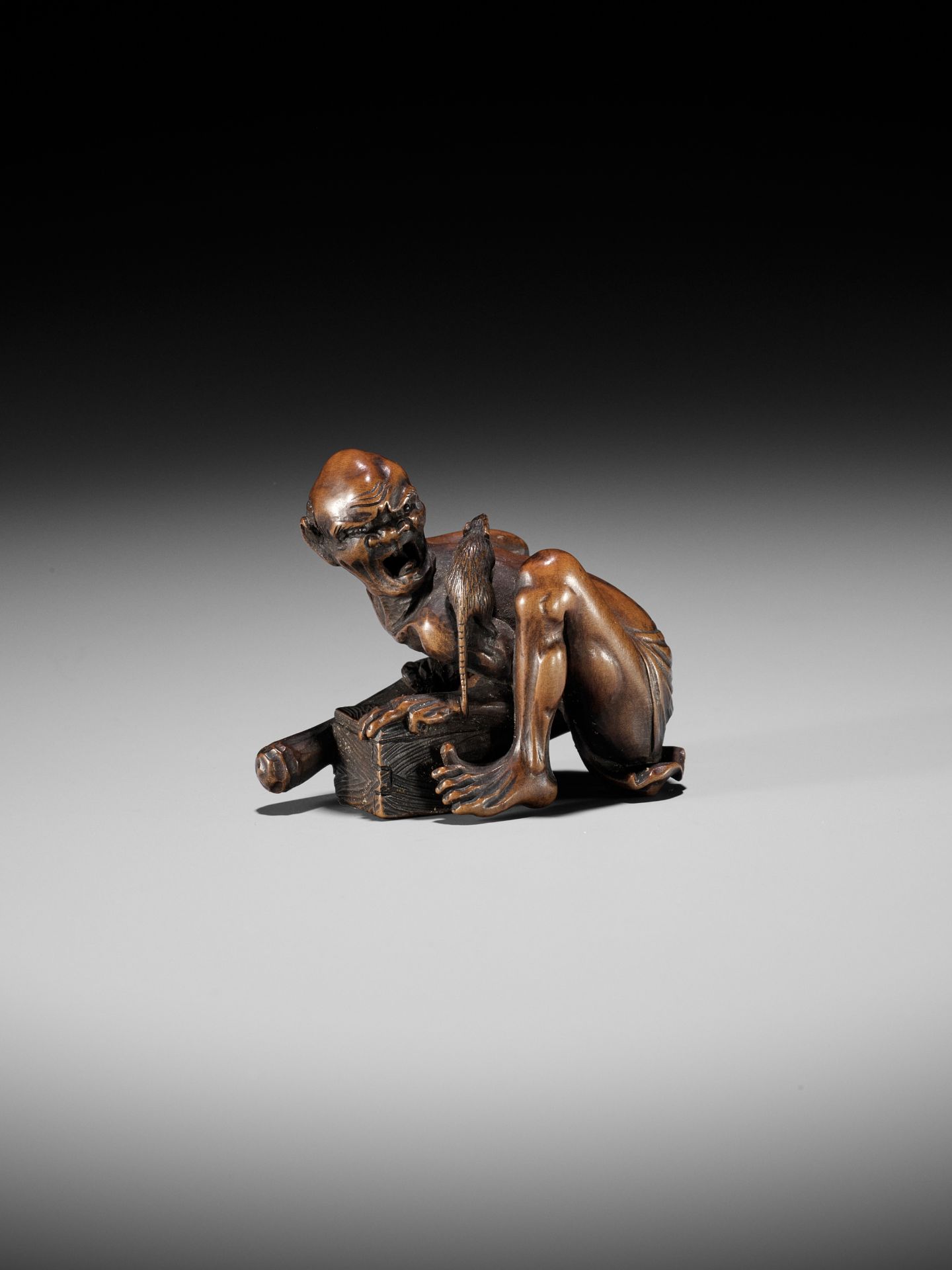 A FINE WOOD OKIMONO NETSUKE OF AN EMACIATED RAT CATCHER - Image 8 of 9