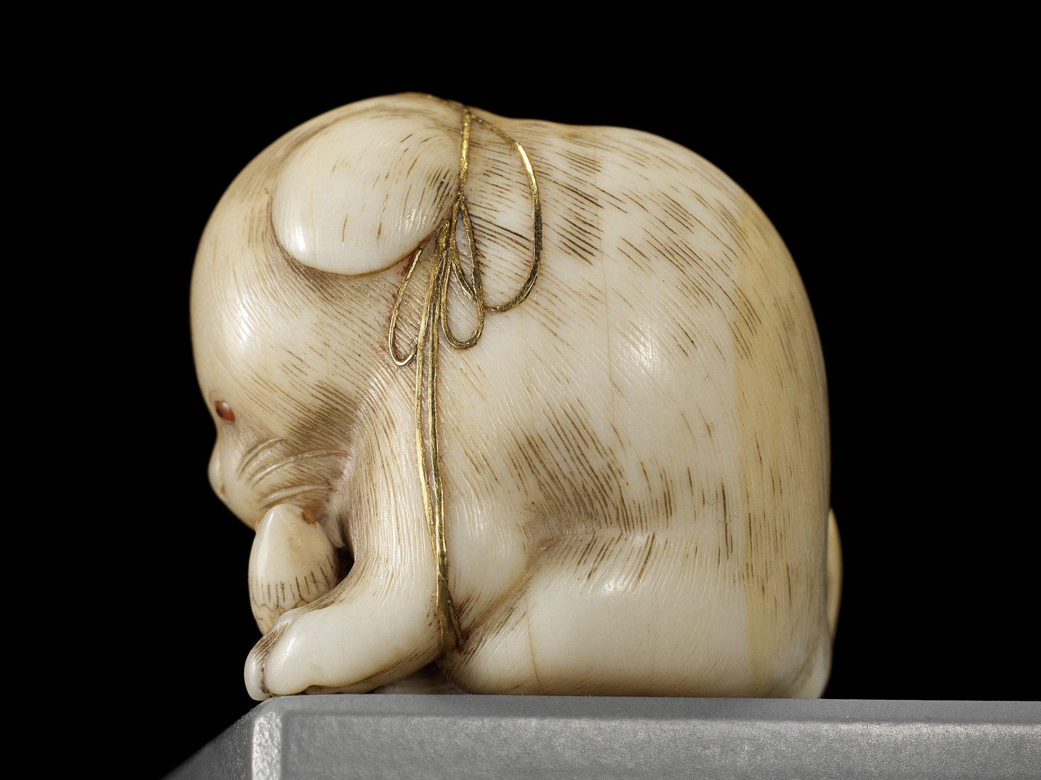 KAIGYOKUSAI MASATSUGU: A SUPERB IVORY NETSUKE OF A PUPPY WITH TOY BIRD - Image 15 of 16