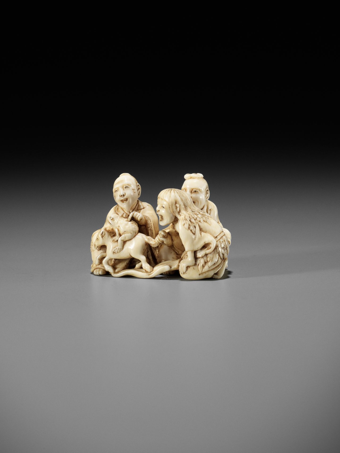 IKKOSAI: AN AMUSING IVORY NETSUKE OF GAMA, CHOKARO, AND TEKKAI SENNIN - Image 8 of 12