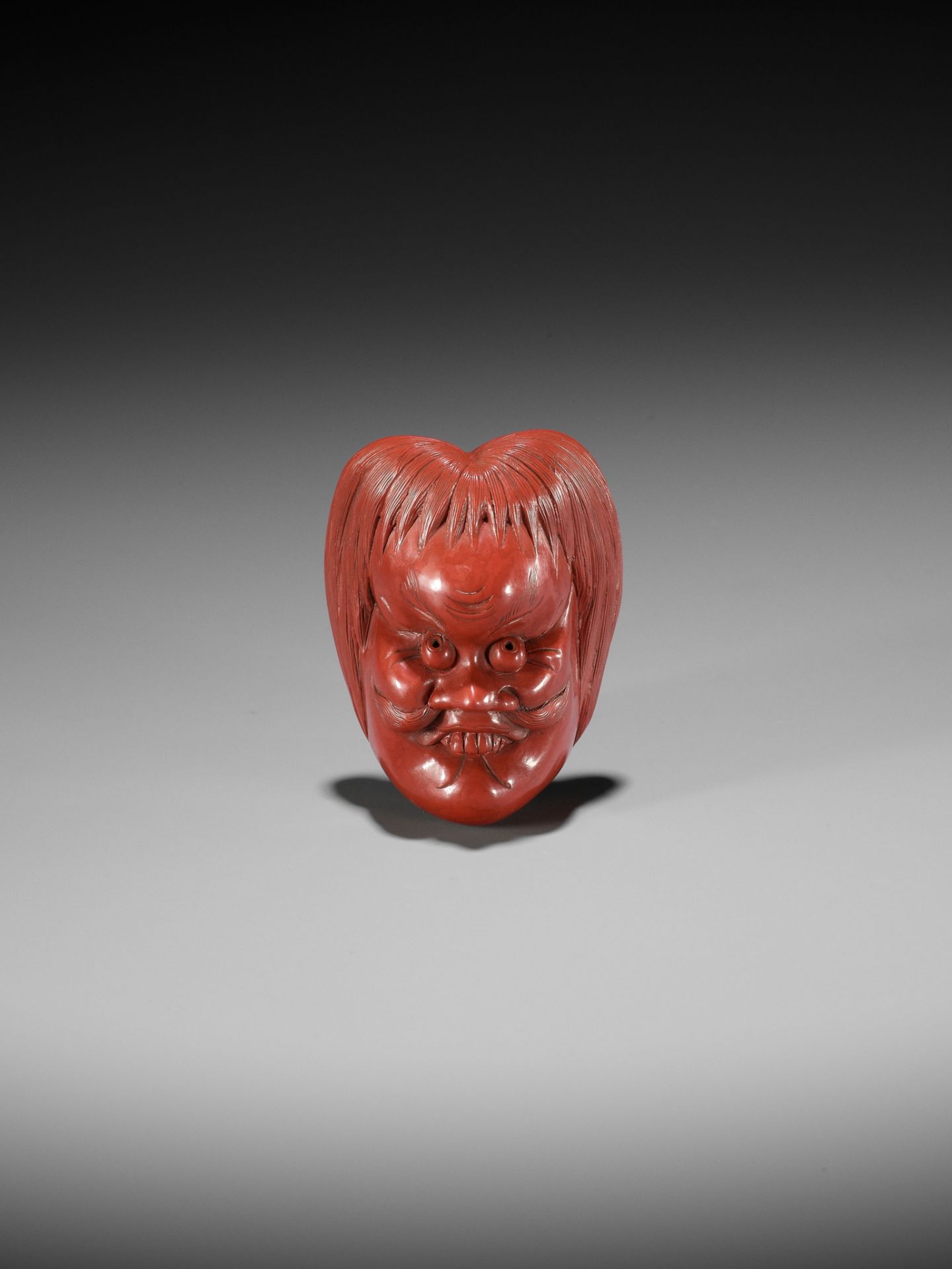 HOKEI: A MASTERFUL TSUISHU (RED LACQUER) MASK NETSUKE OF A SHOJO - Bild 10 aus 13