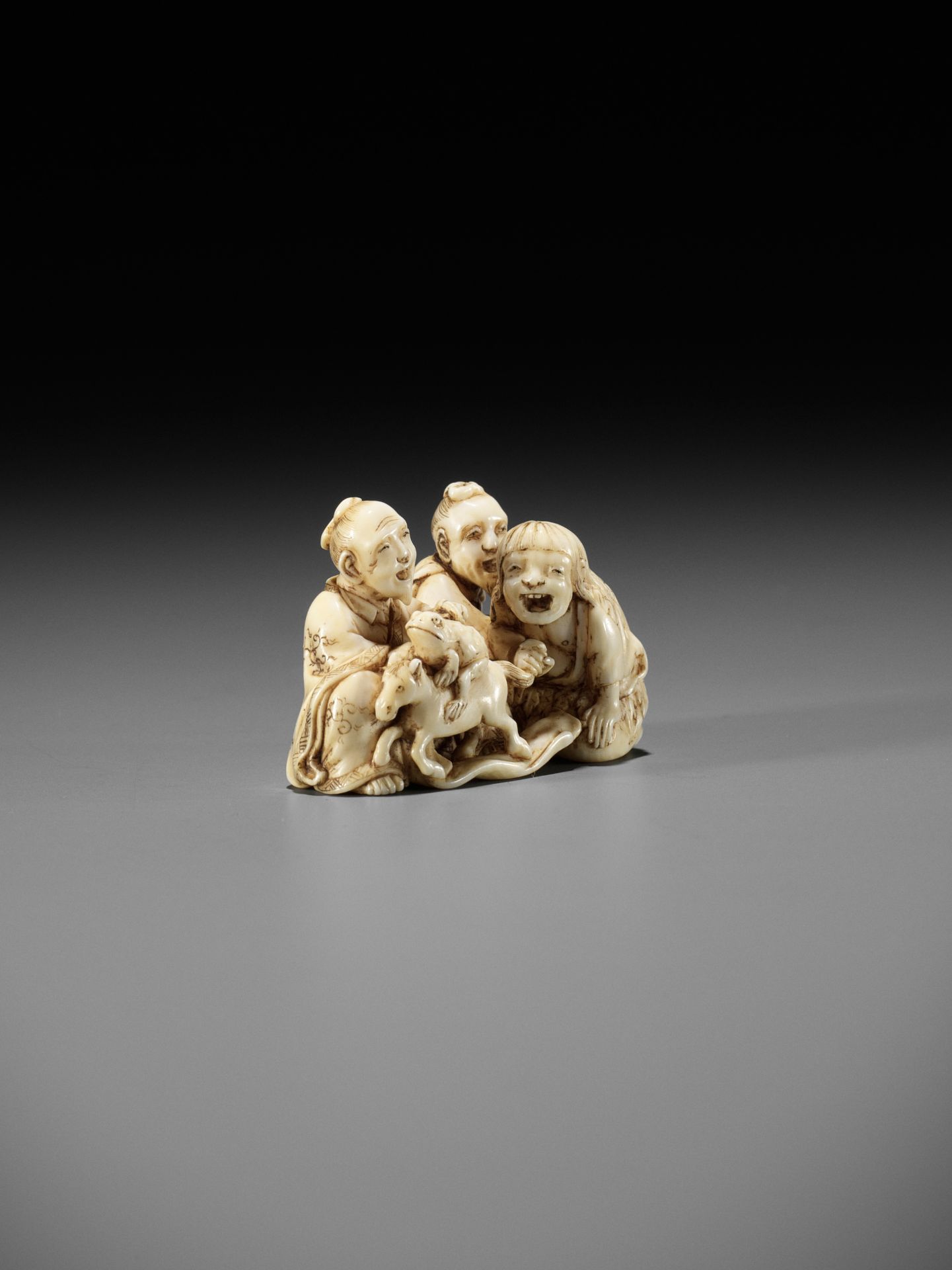 IKKOSAI: AN AMUSING IVORY NETSUKE OF GAMA, CHOKARO, AND TEKKAI SENNIN - Image 6 of 12