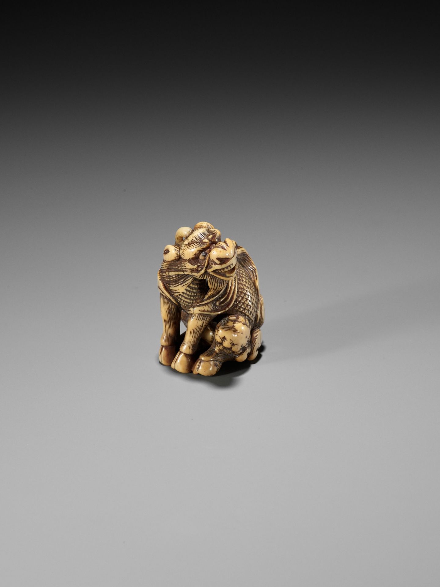 GYOKUZAN: AN IVORY NETSUKE OF A KIRIN - Image 10 of 14