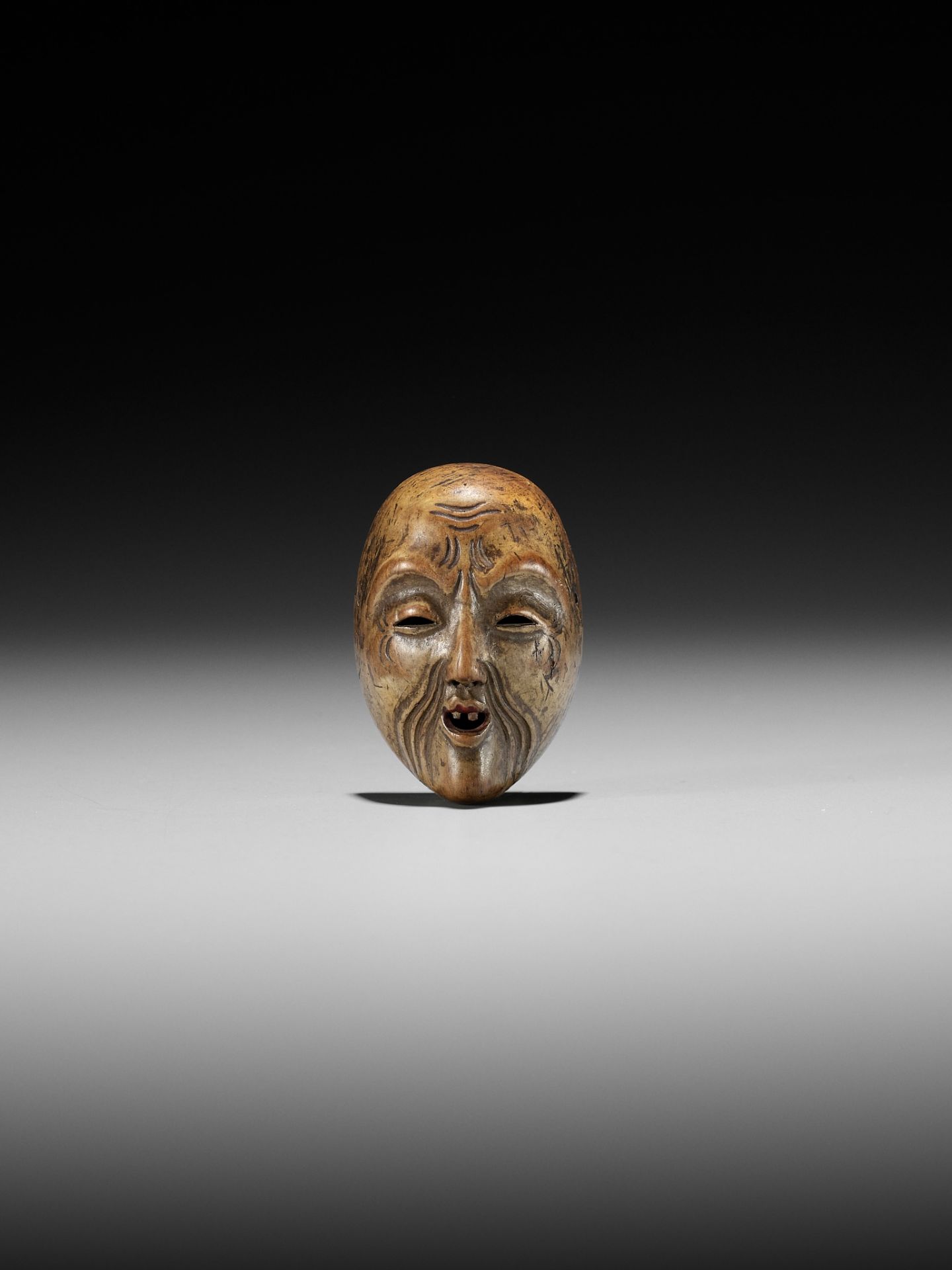 A LACQUERED WOOD MASK NETSUKE OF KOJO - Image 8 of 10