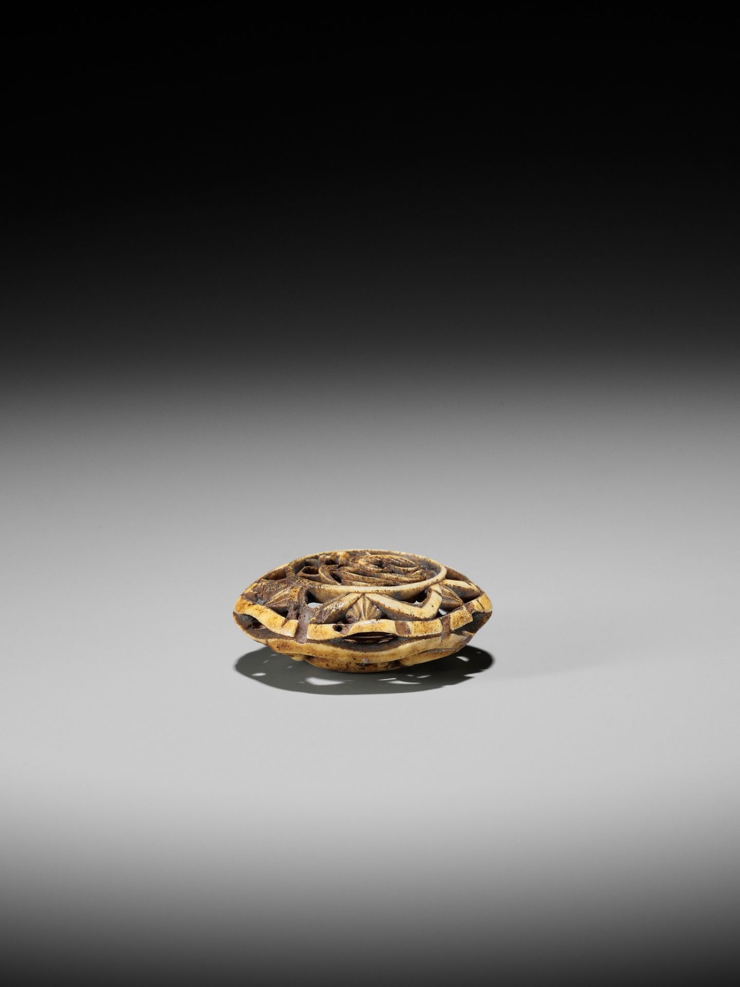 A STAG ANTLER RYUSA MANJU NETSUKE OF A HO-O BIRD AND UNUSUAL MON - Image 11 of 11