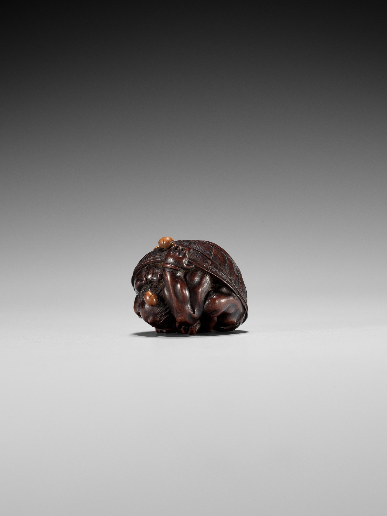 MASAKAZU: A WOOD NETSUKE OF A COWERING ONI DURING SETSUBUN - Image 10 of 13