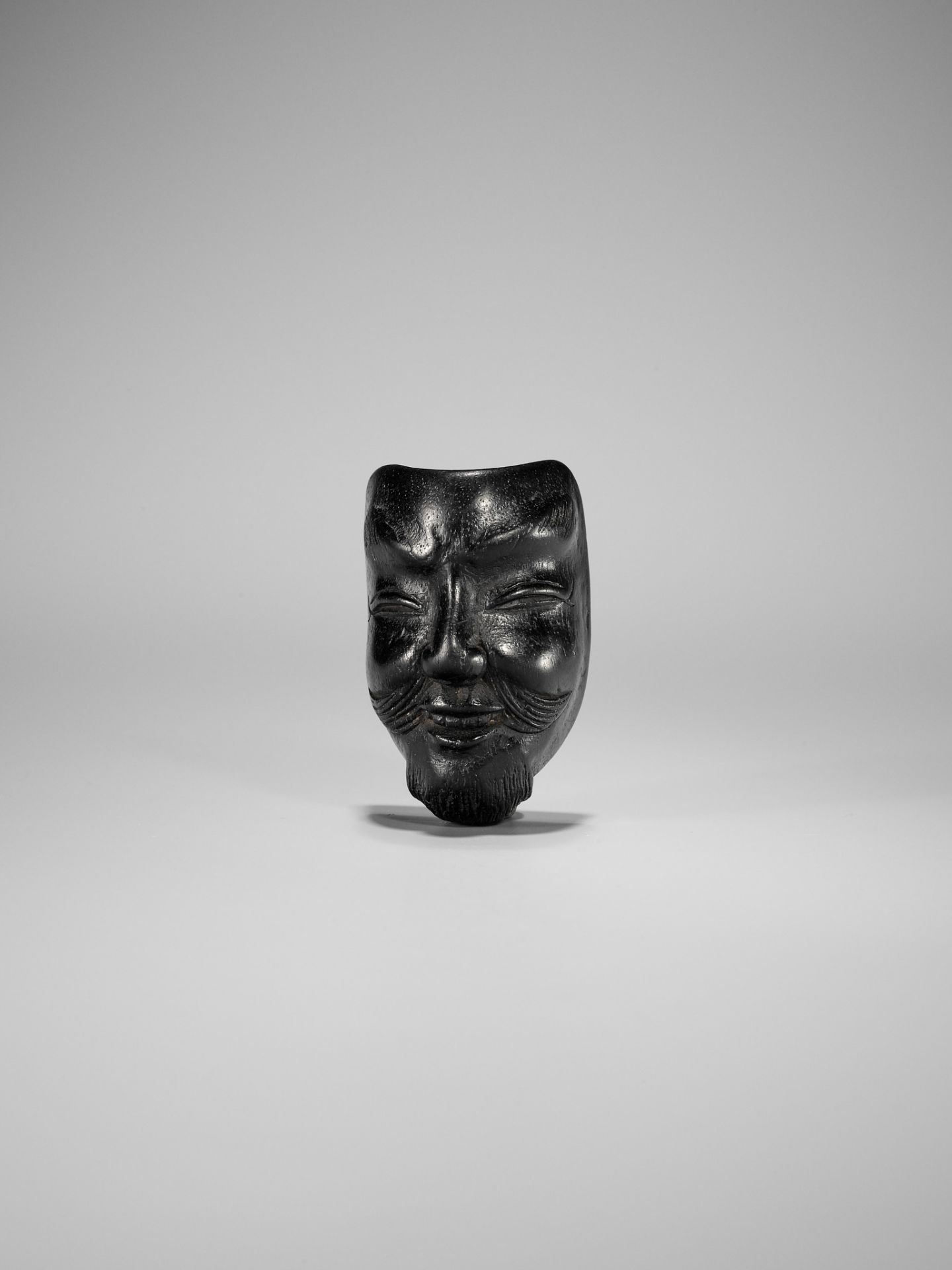 OKATOMO: A VERY RARE EBONY WOOD MASK NETSUKE OF AN OLD MAN (JO) - Image 3 of 10