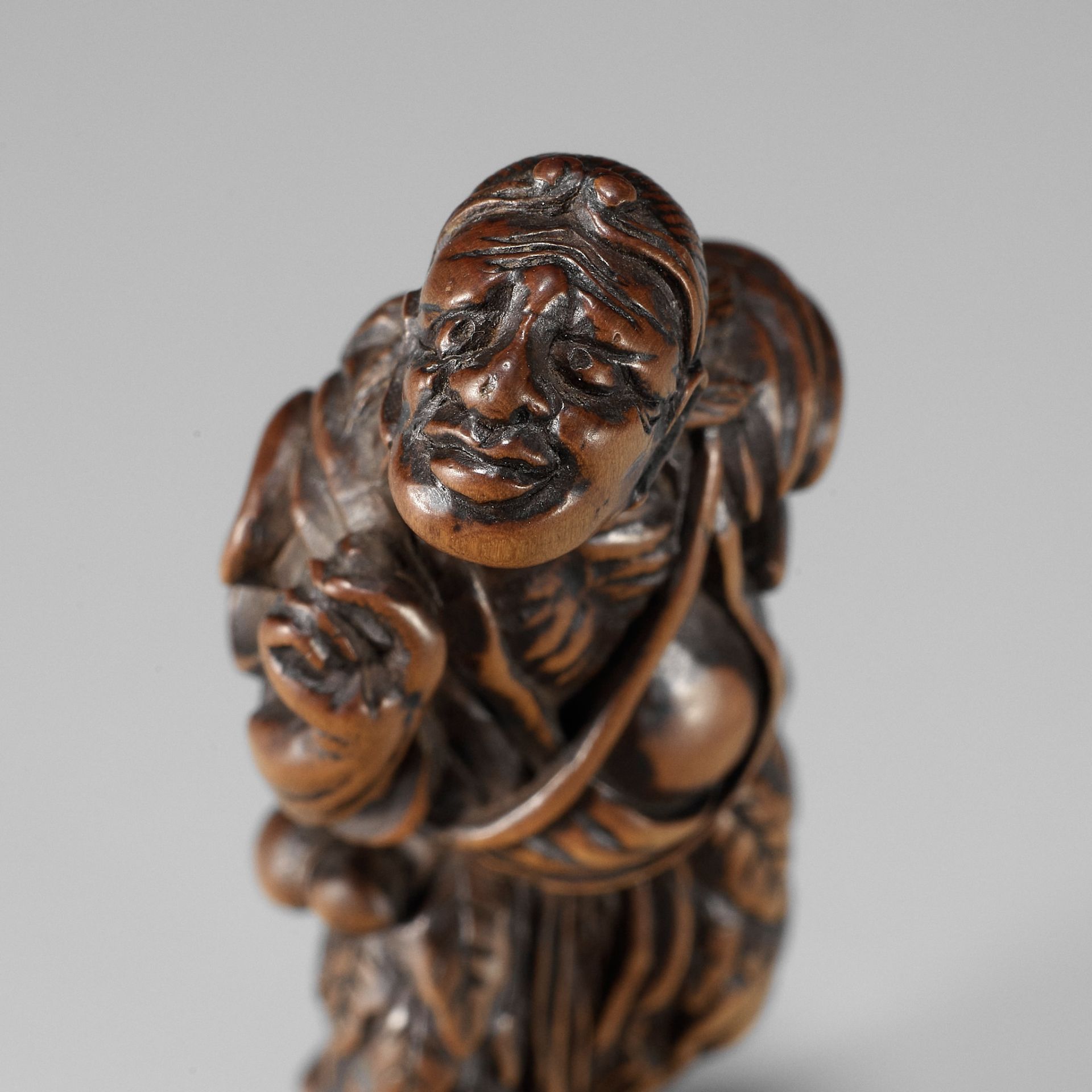 SHUGETSU I: A SUPERB WOOD NETSUKE OF TEKKAI SENNIN Lot 191 - NE0422