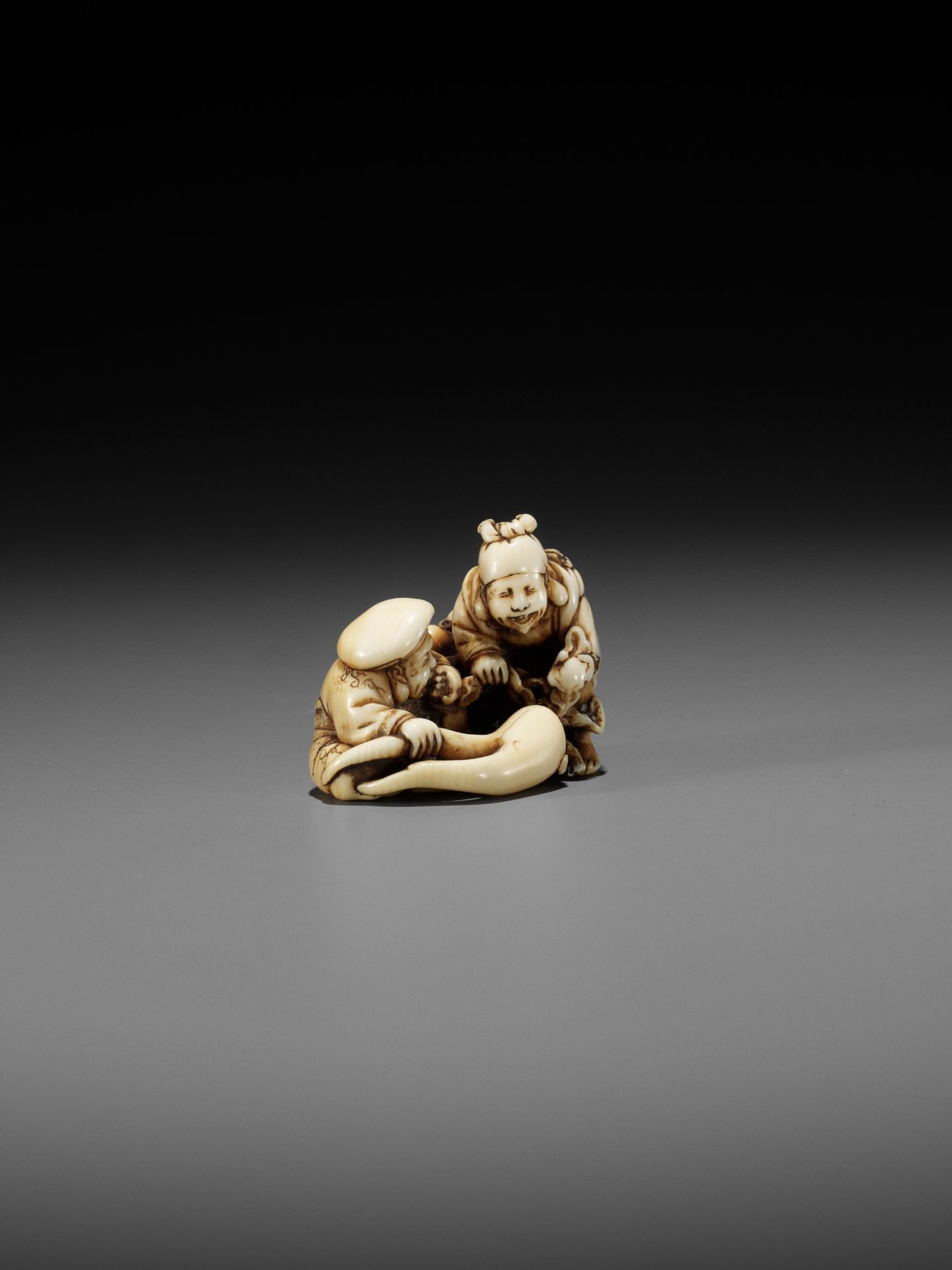 IKKOSAI: AN AMUSING IVORY SHUNGA NETSUKE OF DAIKOKU AND EBISU - Image 8 of 12