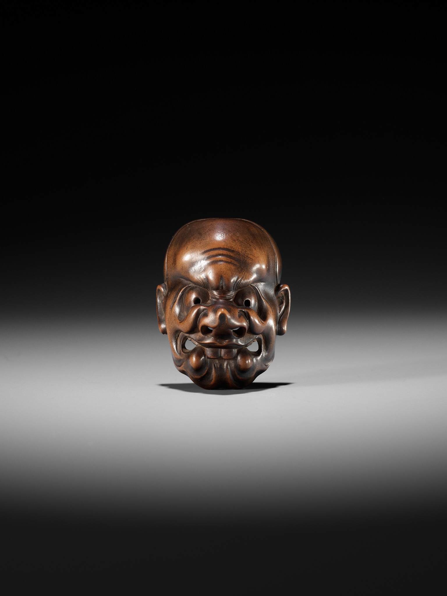KOKEISAI SANSHO: A SUPERB STAINED WOOD MASK NETSUKE OF A GHOUL - Image 11 of 13