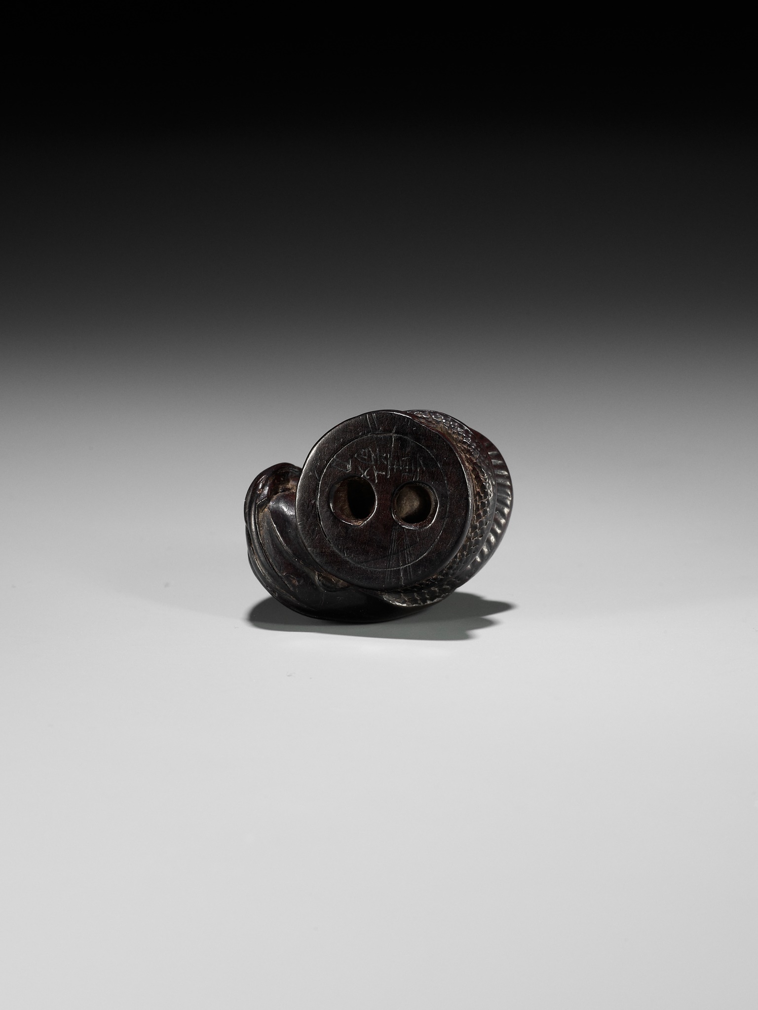 SHIGEYOSHI: AN INLAID DARK WOOD NETSUKE OF KIYOHIME - Image 10 of 11