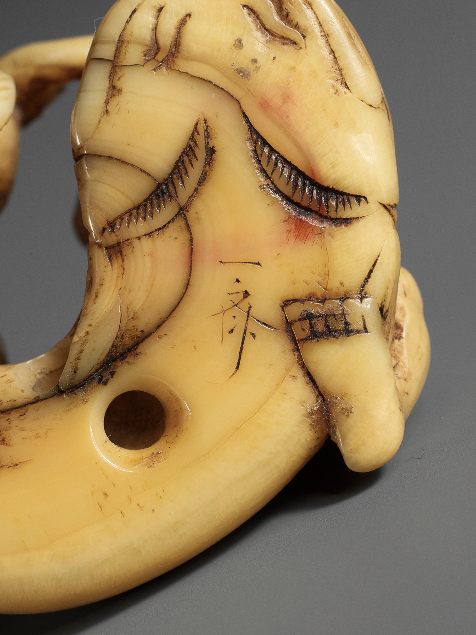 ISSAI: A RARE NARWHAL TUSK NETSUKE OF KADORI MYOJIN TAMING THE NAMAZU - Image 17 of 17