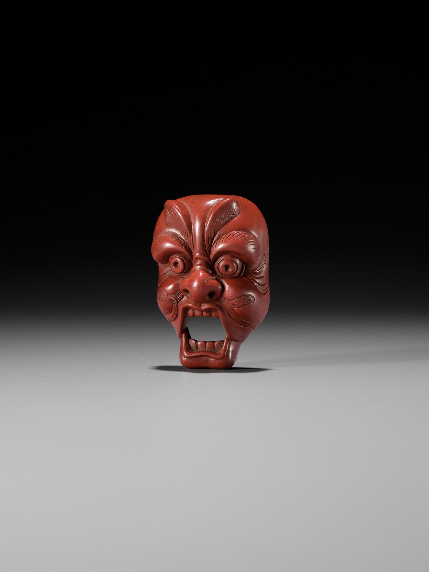 JOKO: A RARE TSUISHU (RED LACQUER) BUGAKU MASK NETSUKE OF GENJORAKU - Image 2 of 12