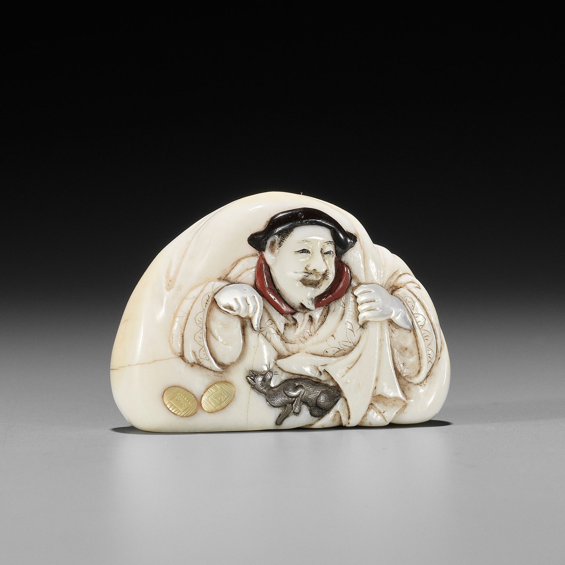 HOKOKU: A SHIBAYAMA-INLAID IVORY NETSUKE DEPICTING DAIKOKU