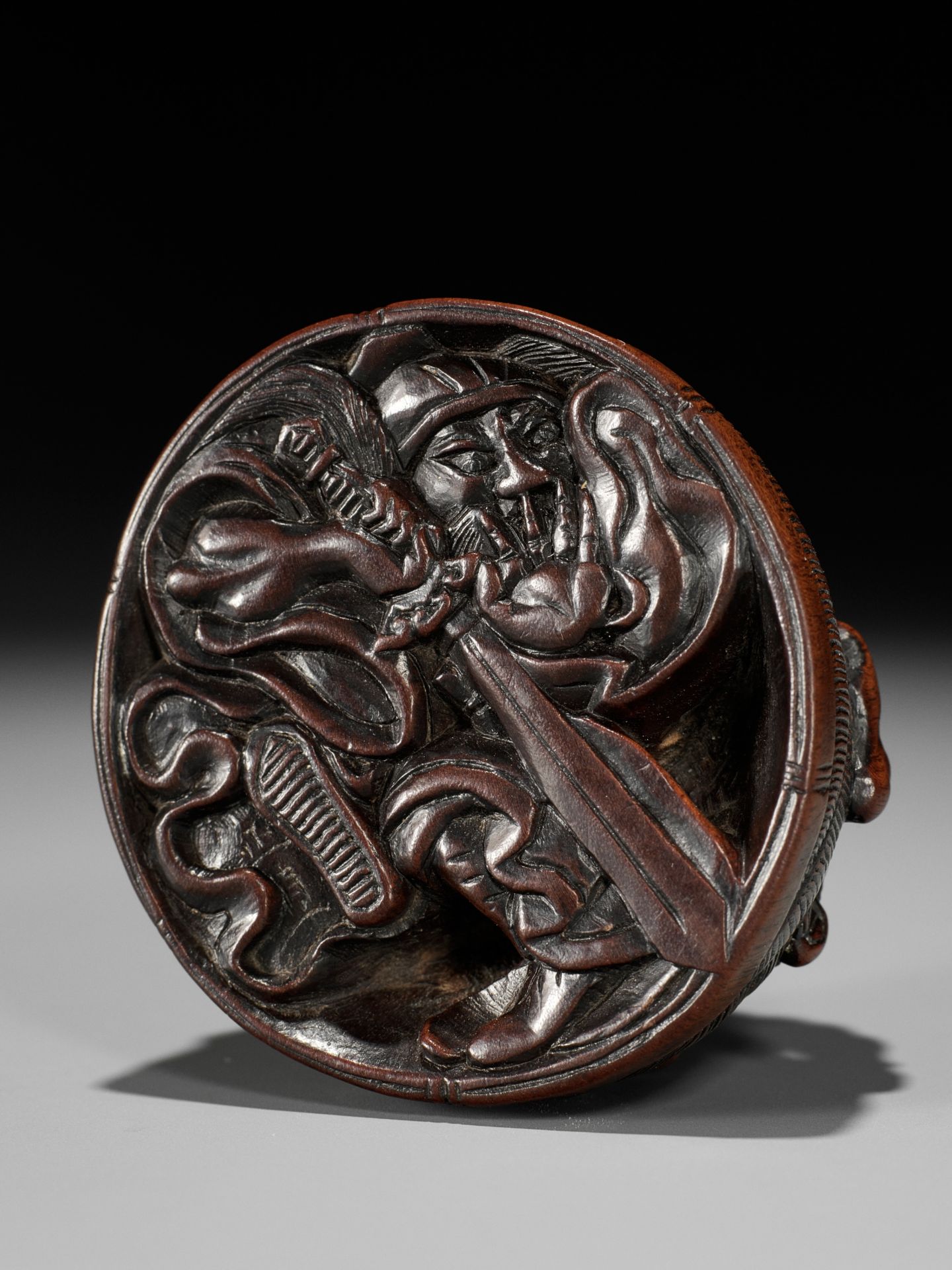 MASANAO: A RARE WOOD NETSUKE OF AN ONI TRAPPING SHOKI - Image 2 of 14