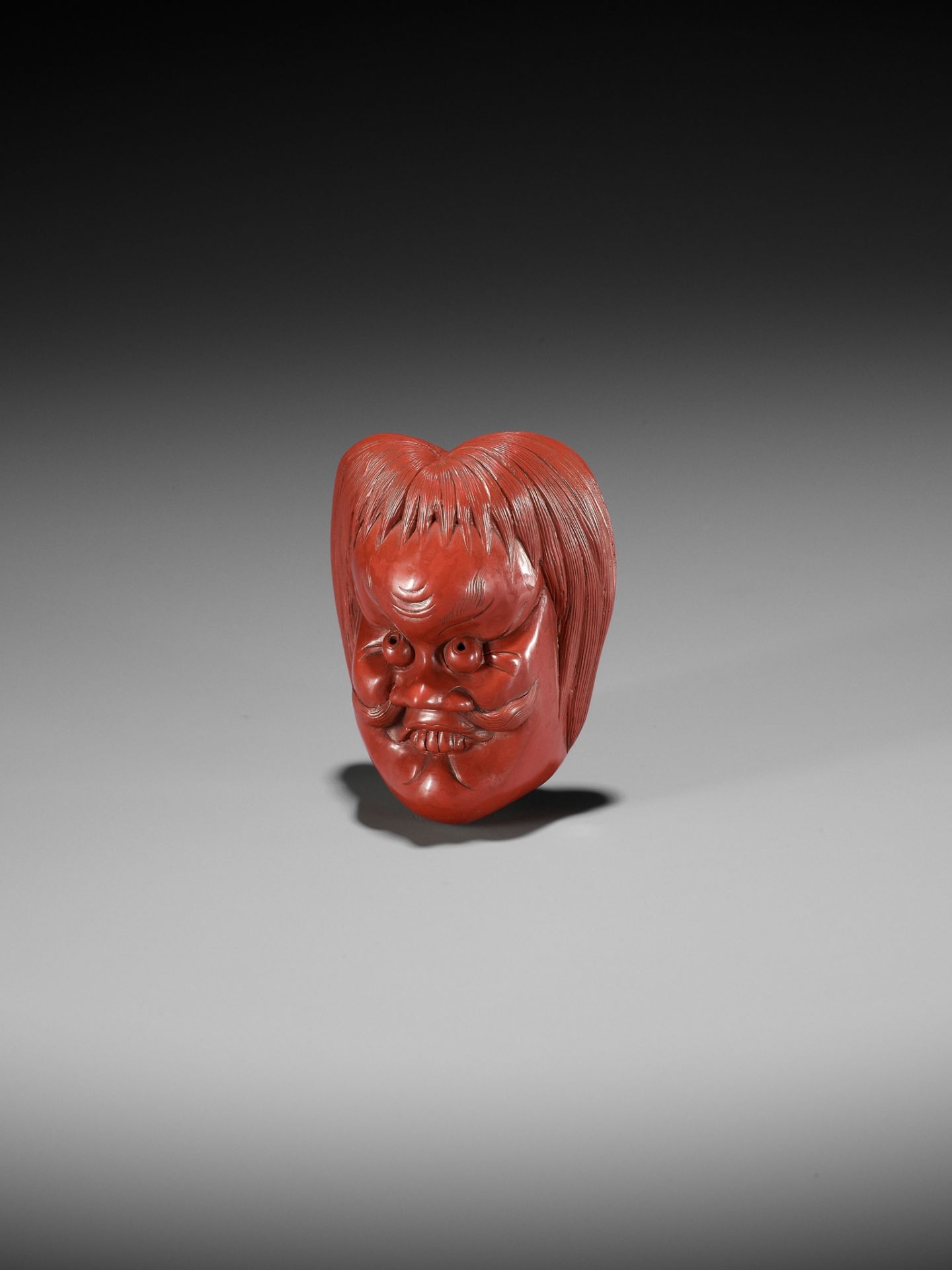 HOKEI: A MASTERFUL TSUISHU (RED LACQUER) MASK NETSUKE OF A SHOJO - Bild 4 aus 13