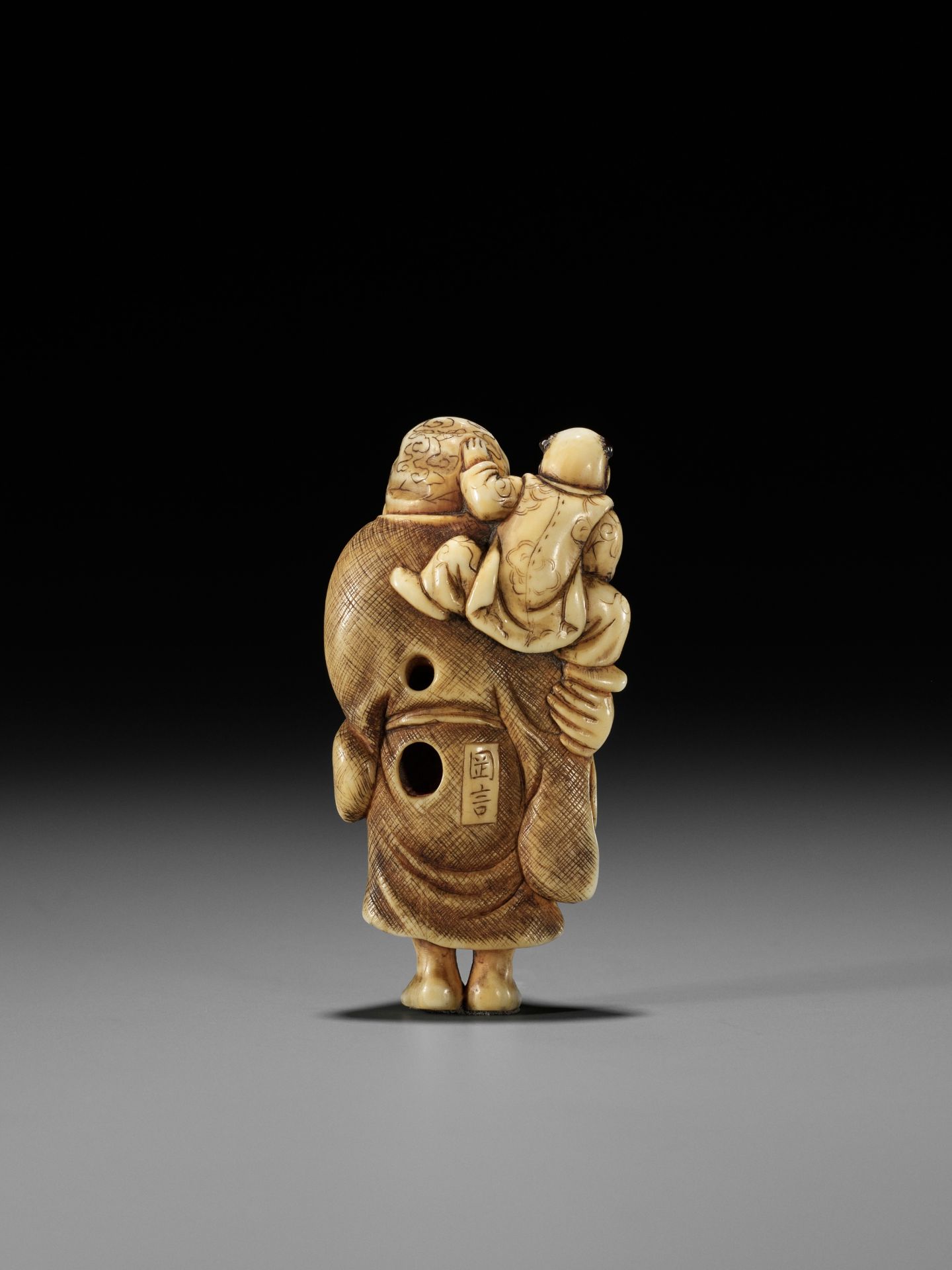 OKAKOTO: AN IVORY NETSUKE OF HOTEI WITH KARAKO - Image 2 of 12