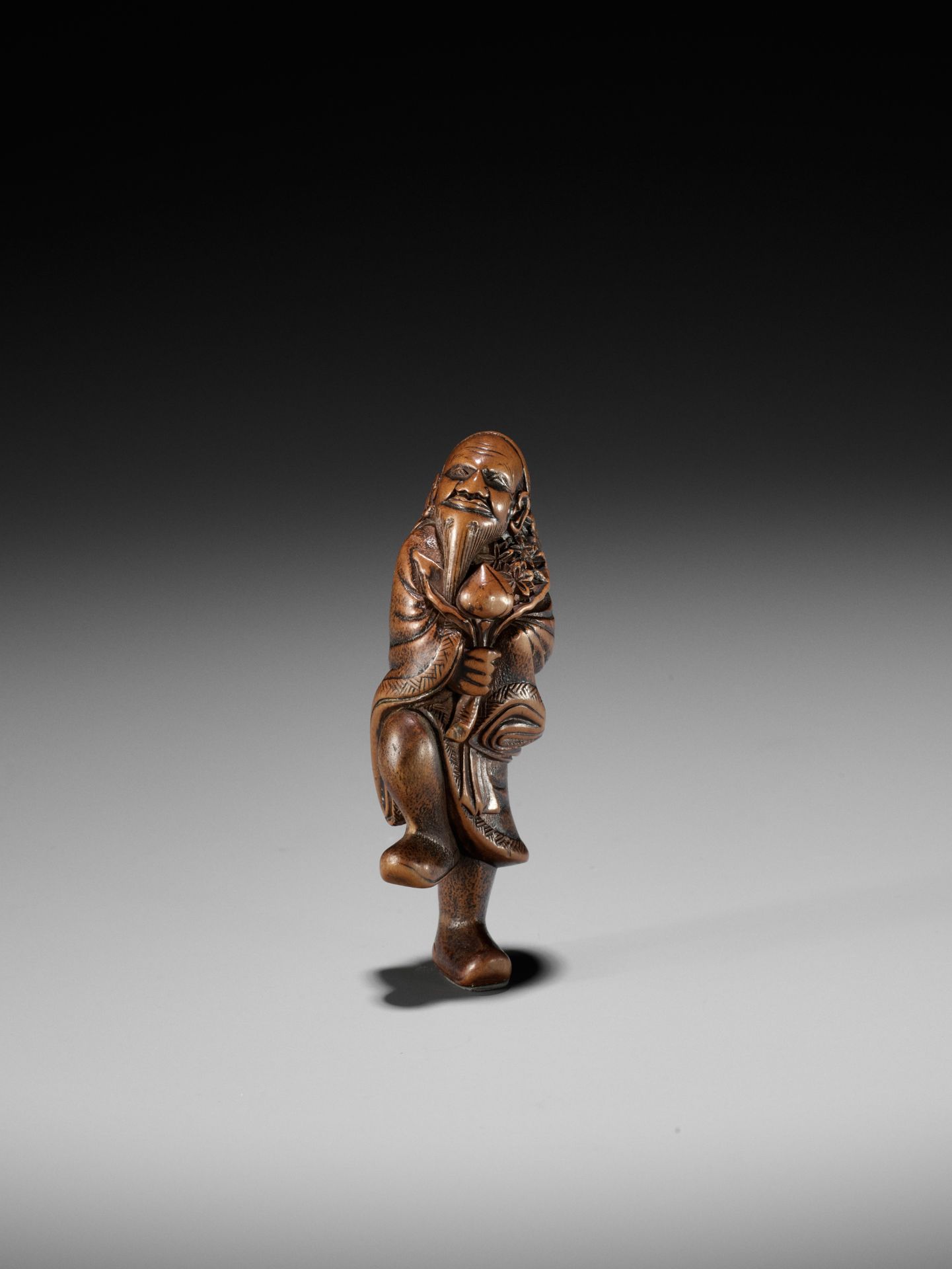 A FINE WOOD NETSUKE OF TOBOSAKU SENNIN - Bild 7 aus 8