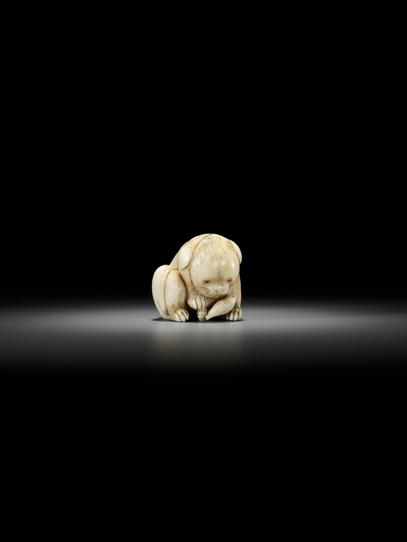 KAIGYOKUSAI MASATSUGU: A SUPERB IVORY NETSUKE OF A PUPPY WITH TOY BIRD - Image 2 of 16