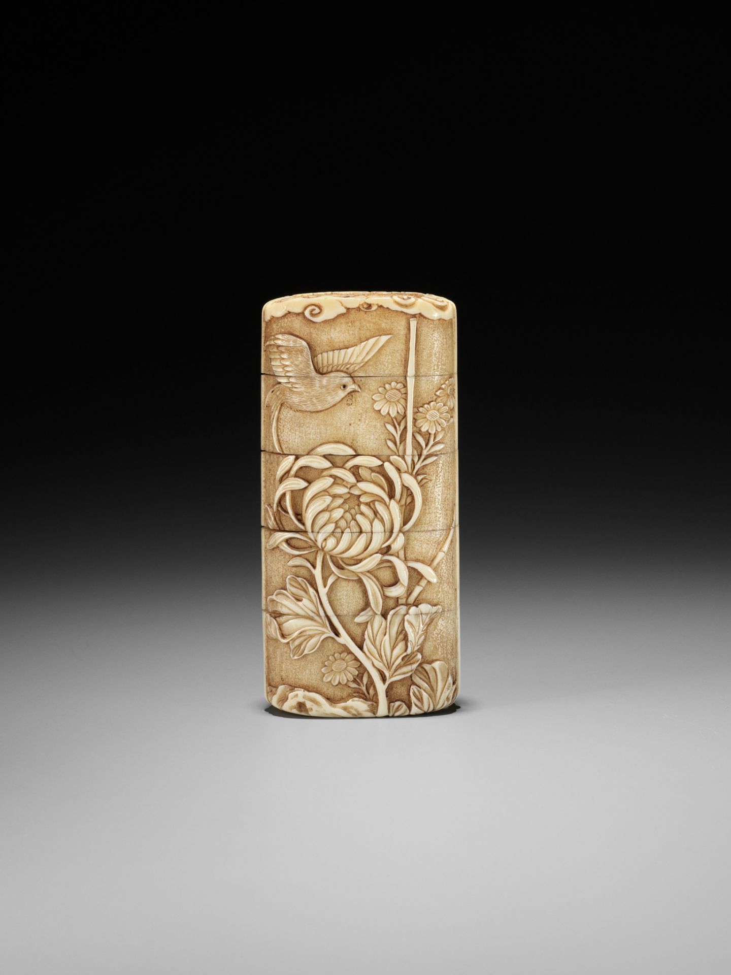 A MASTERFUL WALRUS TUSK FOUR-CASE INRO DEPICTING A SWALLOW AMONGST FLOWERS - Image 3 of 12
