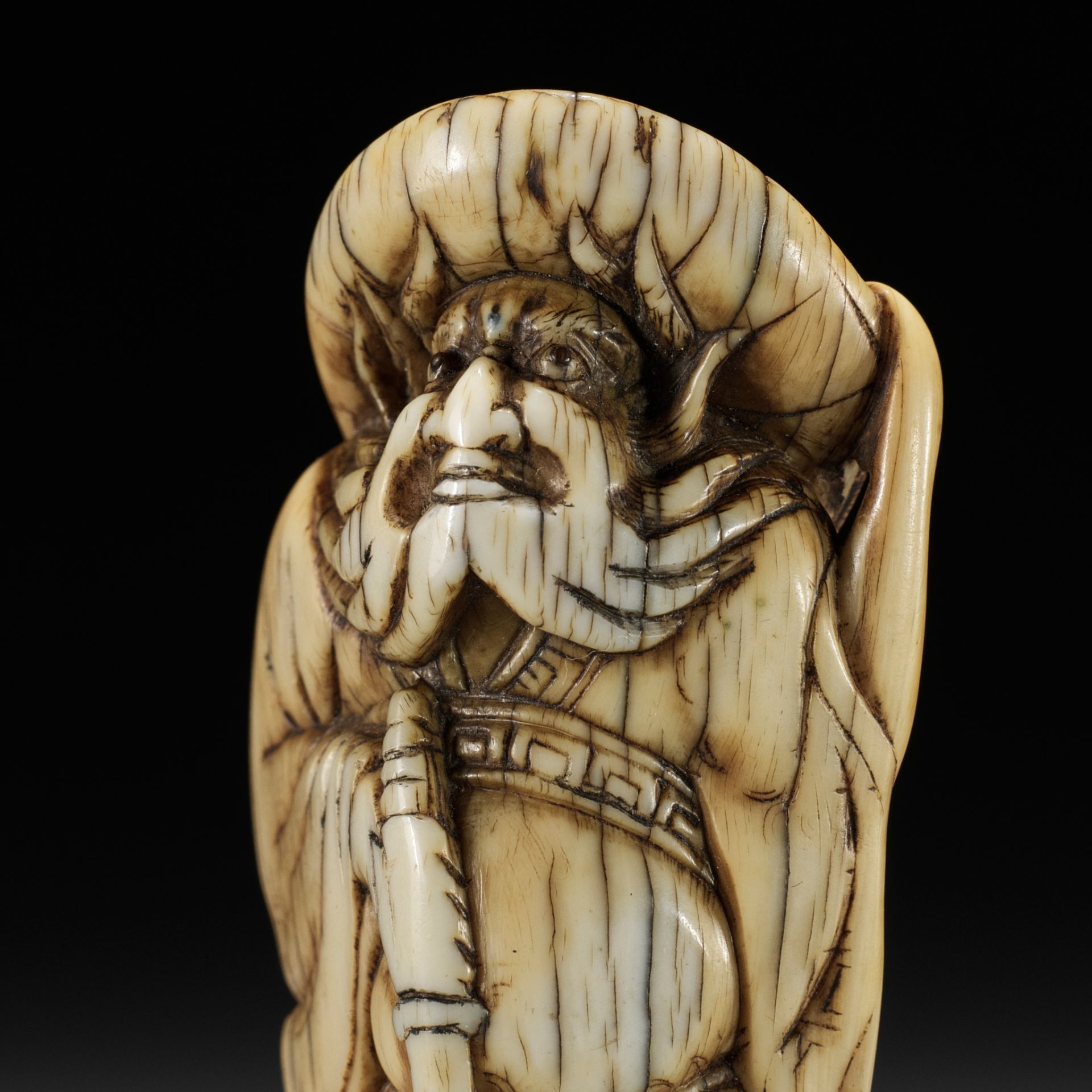 A GOOD KYOTO SCHOOL IVORY NETSUKE OF SHOKI, ATTRIBUTED TO OKATOMO