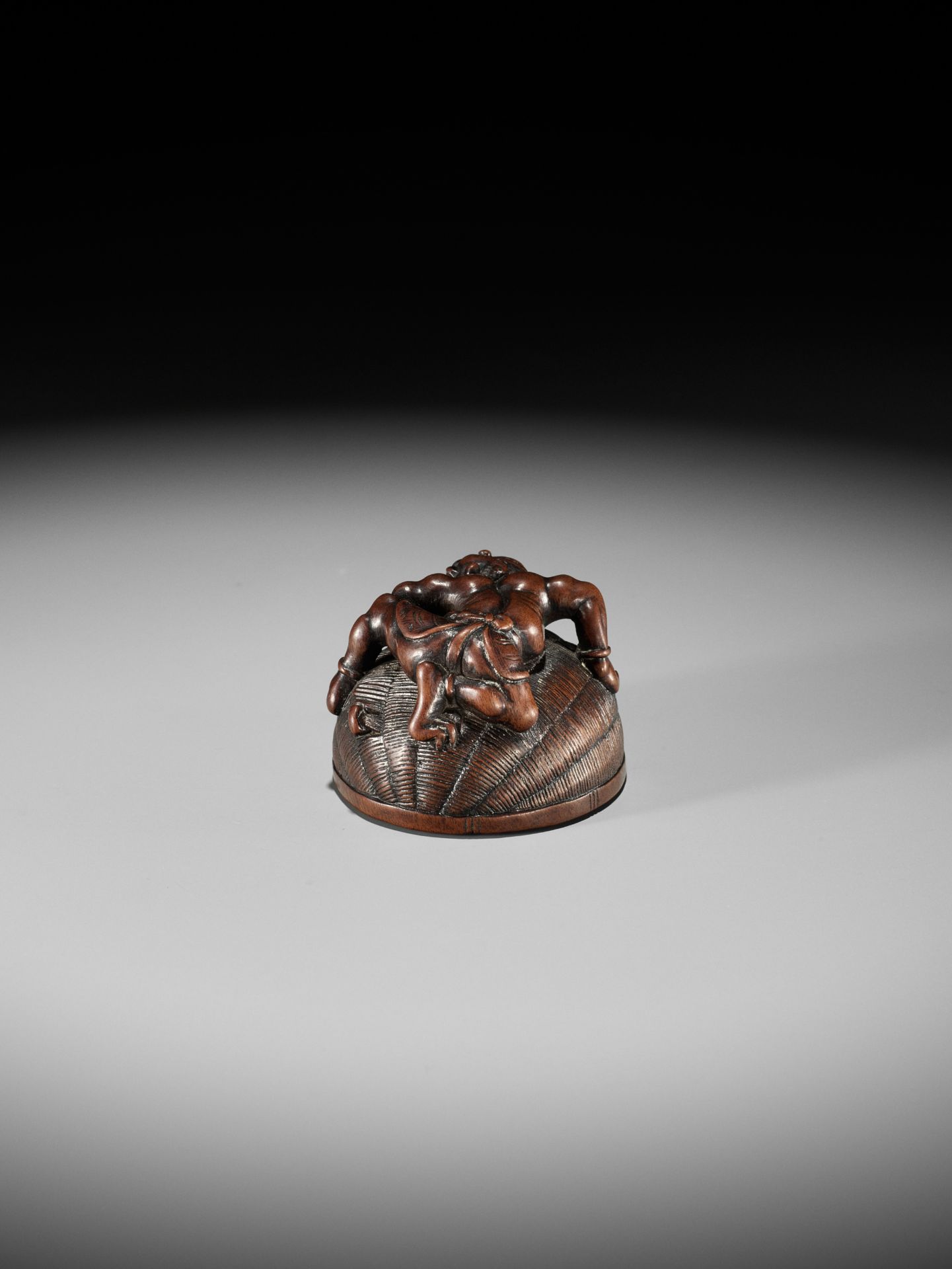 MASANAO: A RARE WOOD NETSUKE OF AN ONI TRAPPING SHOKI - Image 10 of 14