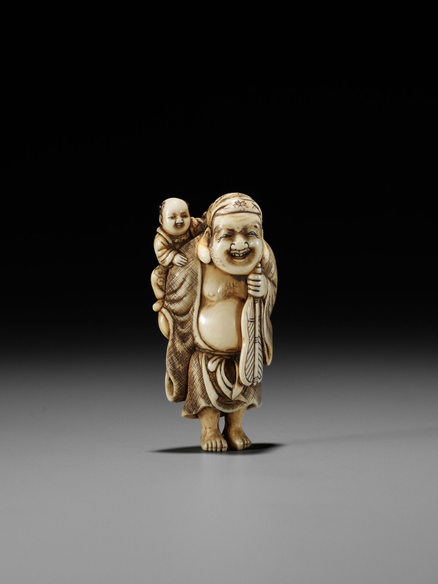 OKAKOTO: AN IVORY NETSUKE OF HOTEI WITH KARAKO - Image 9 of 12