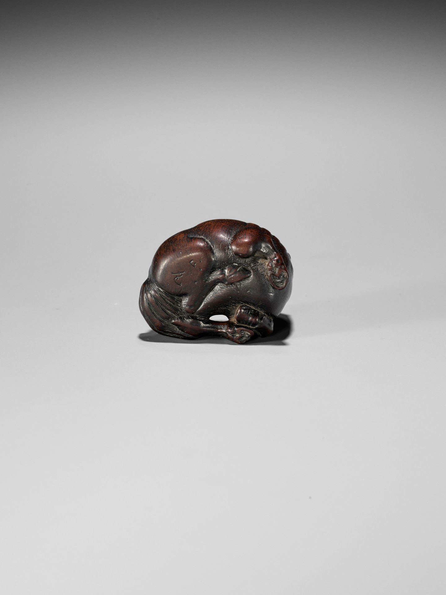 MASAMARU: A FINE WOOD NETSUKE OF A RECUMBENT HORSE - Image 9 of 10