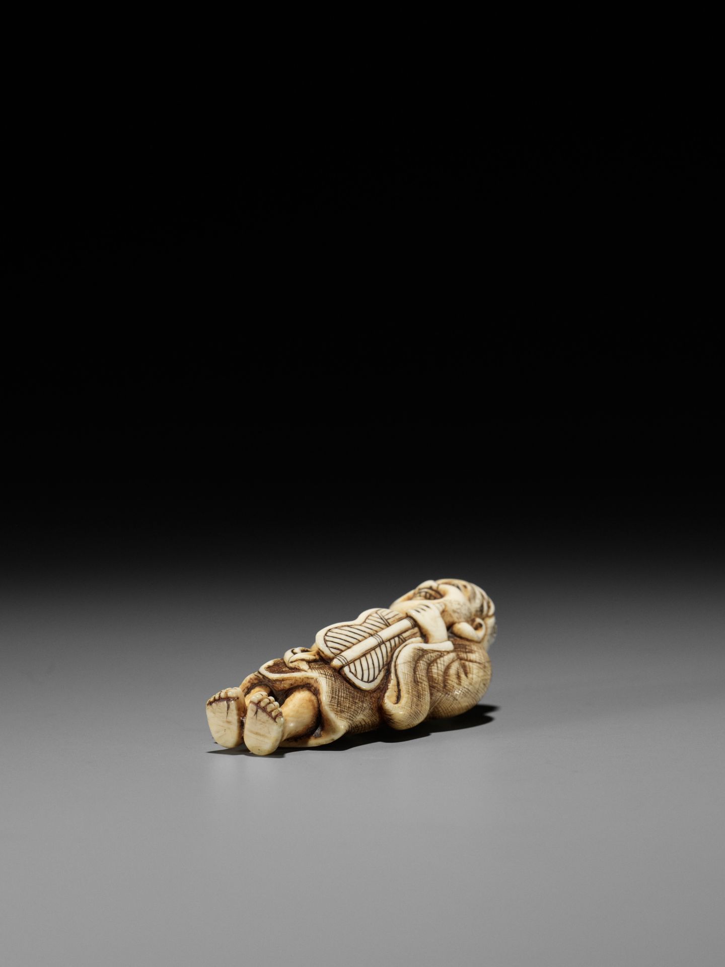 OKAKOTO: AN IVORY NETSUKE OF HOTEI WITH KARAKO - Image 11 of 12