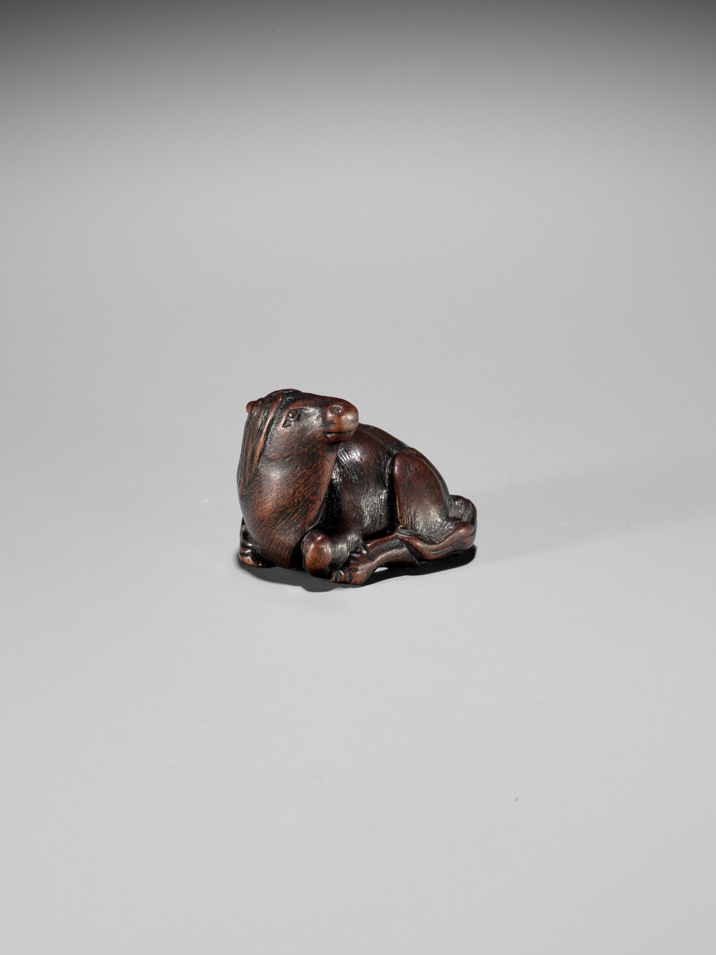 MASAMARU: A FINE WOOD NETSUKE OF A RECUMBENT HORSE - Image 2 of 10