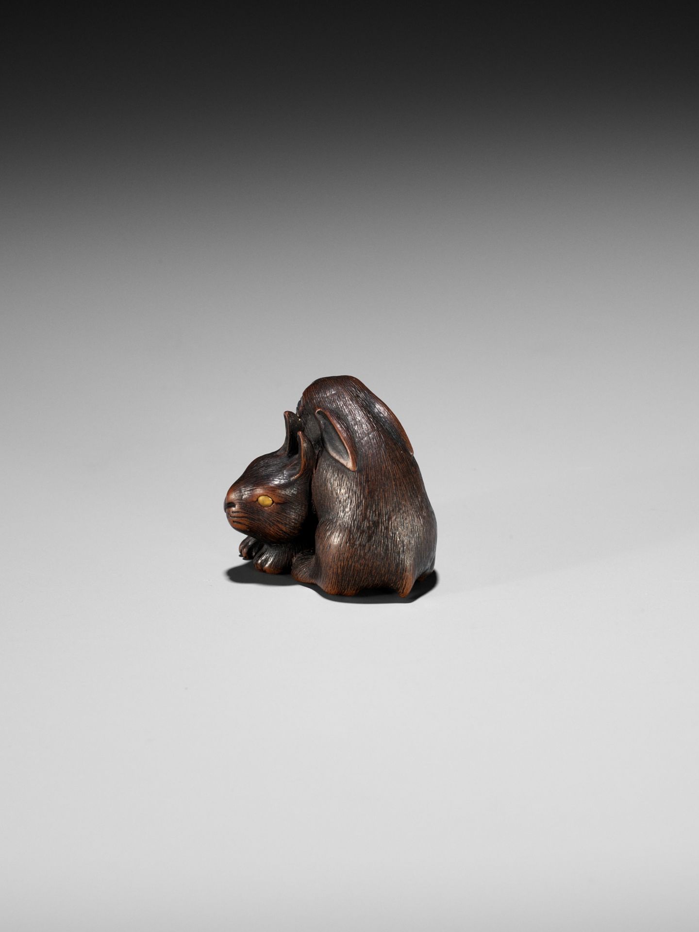 MASATADA: A FINE WOOD NETSUKE OF TWO RABBITS WITH AMBER EYES - Image 7 of 11